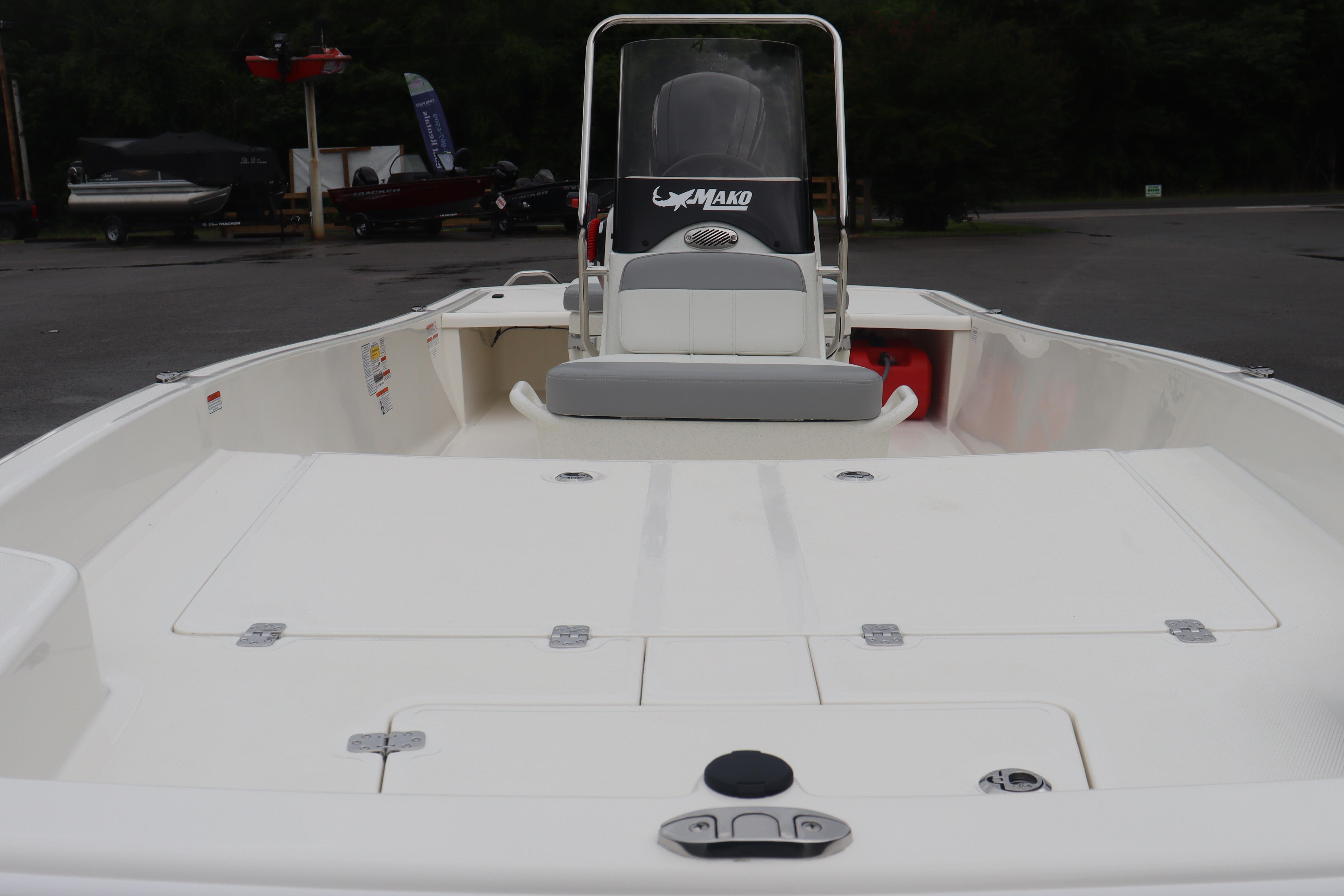 2026 Mako Pro Skiff 17 CC boat interior with seating and storage compartments.