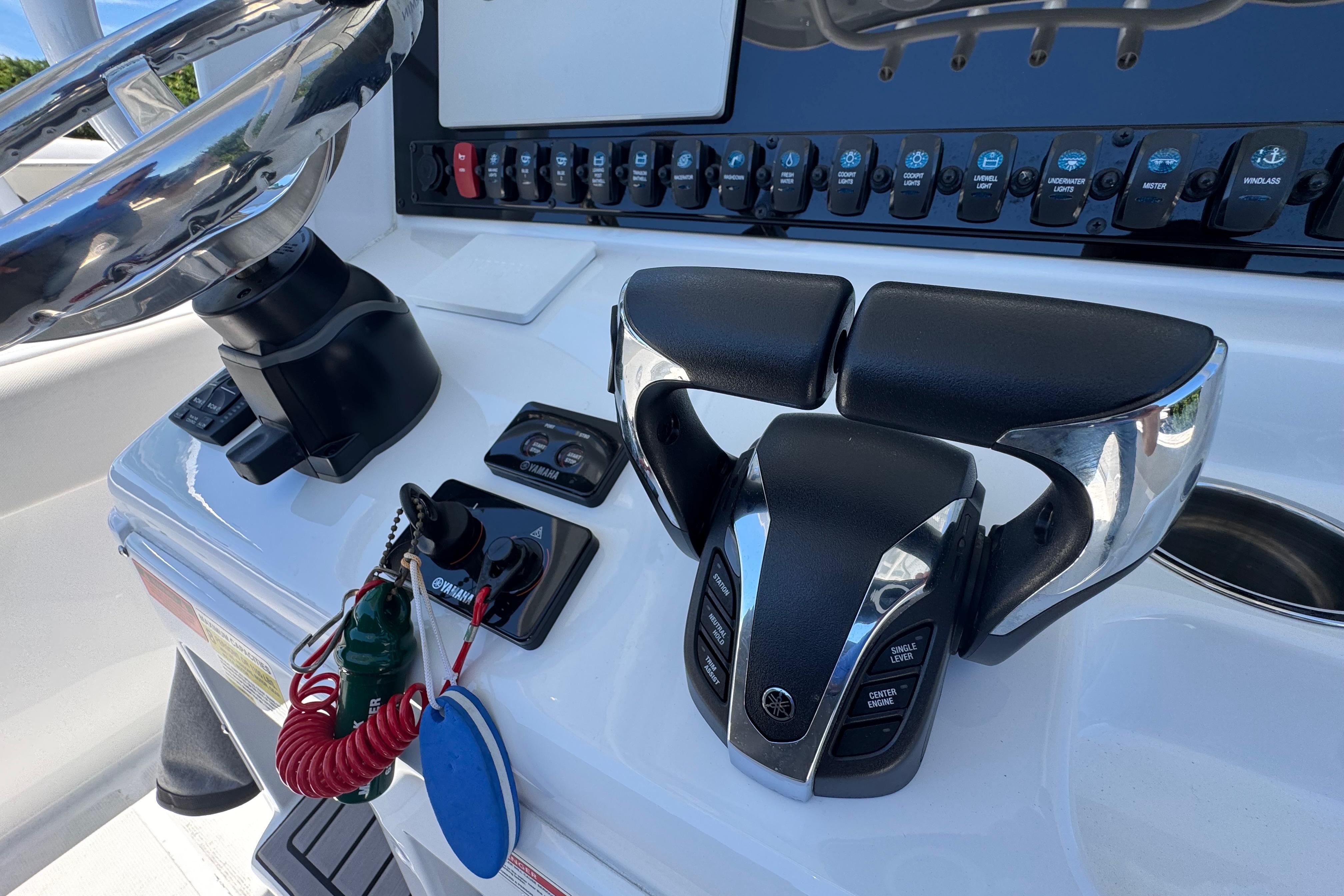 2023 Sea Hunt Gamefish 25 helm with Yamaha controls and steering wheel.