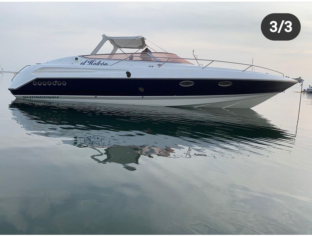 1994 Sunseeker Hawk 31 on calm water.