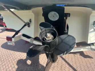 2005 Bayliner 205 Bowrider boat propeller and stern view.