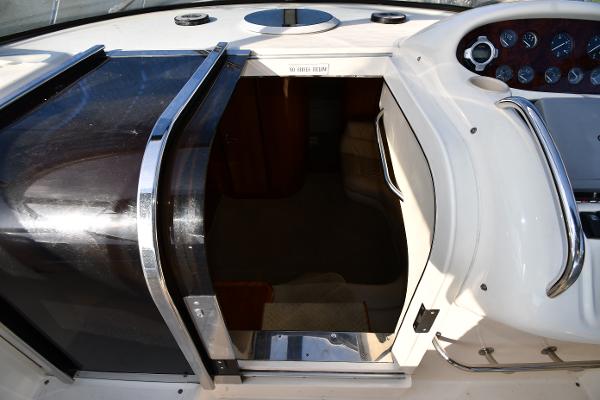 1997 Sunseeker Camargue 47 yacht cockpit entrance with sleek design and control panel.