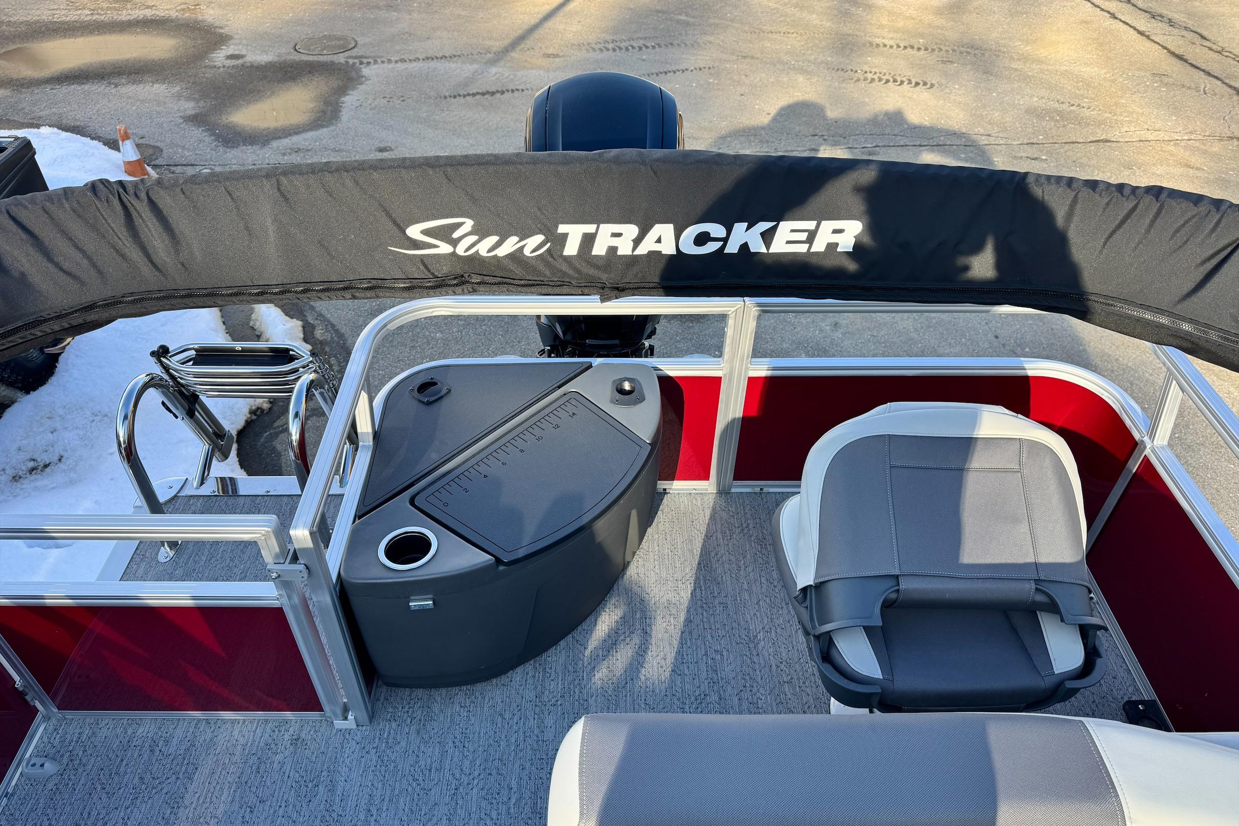 2026 Sun Tracker Bass Buggy 18 DLX pontoon boat interior with seating and console.