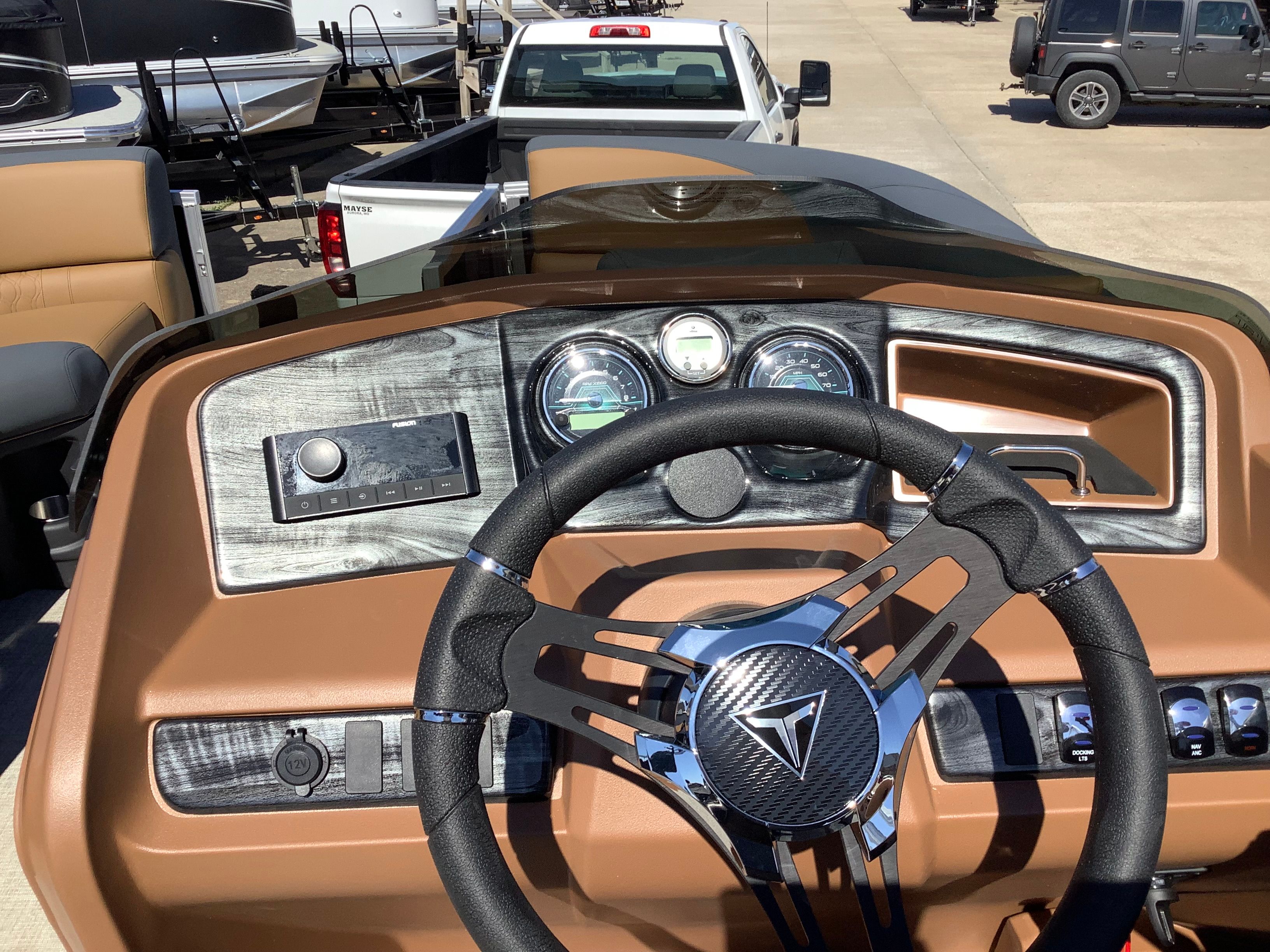 Interior view of 2026 Tahoe 2385 LTZ Quad Lounger Shift boat.