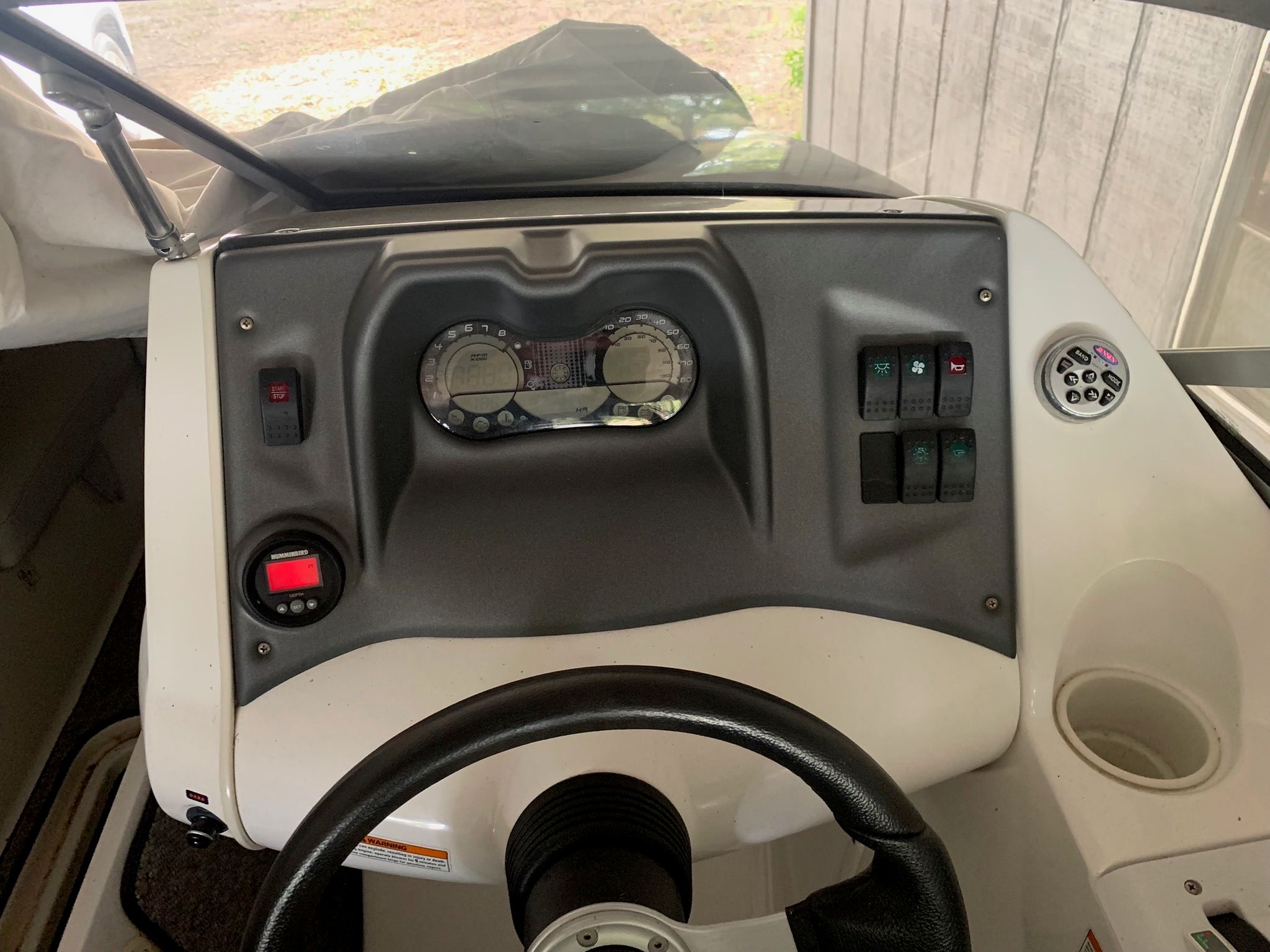 Dashboard of a 2008 Bombardier 180 Challenger boat.