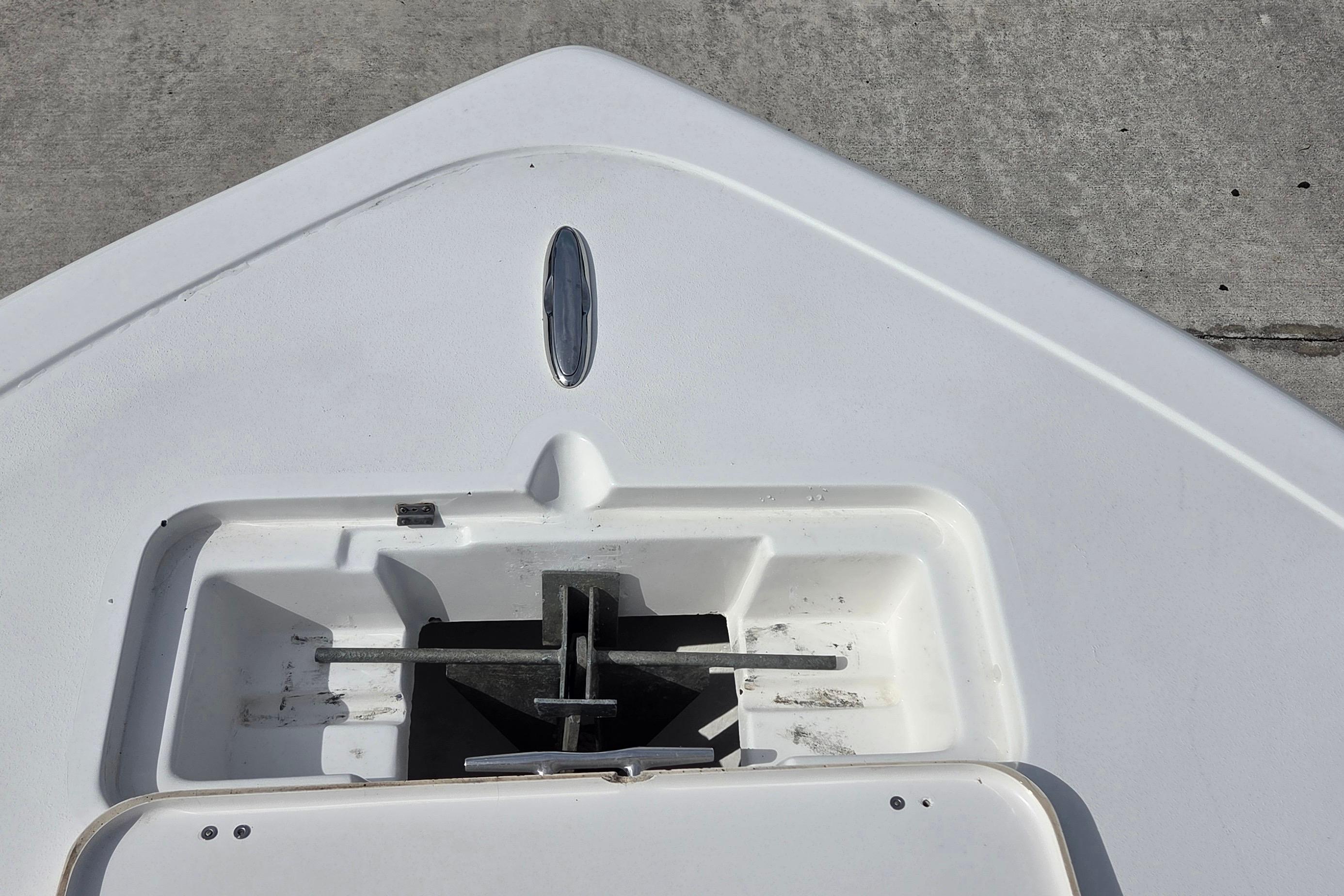 Bow of a 2015 Tidewater 220 LXF boat with anchor compartment.