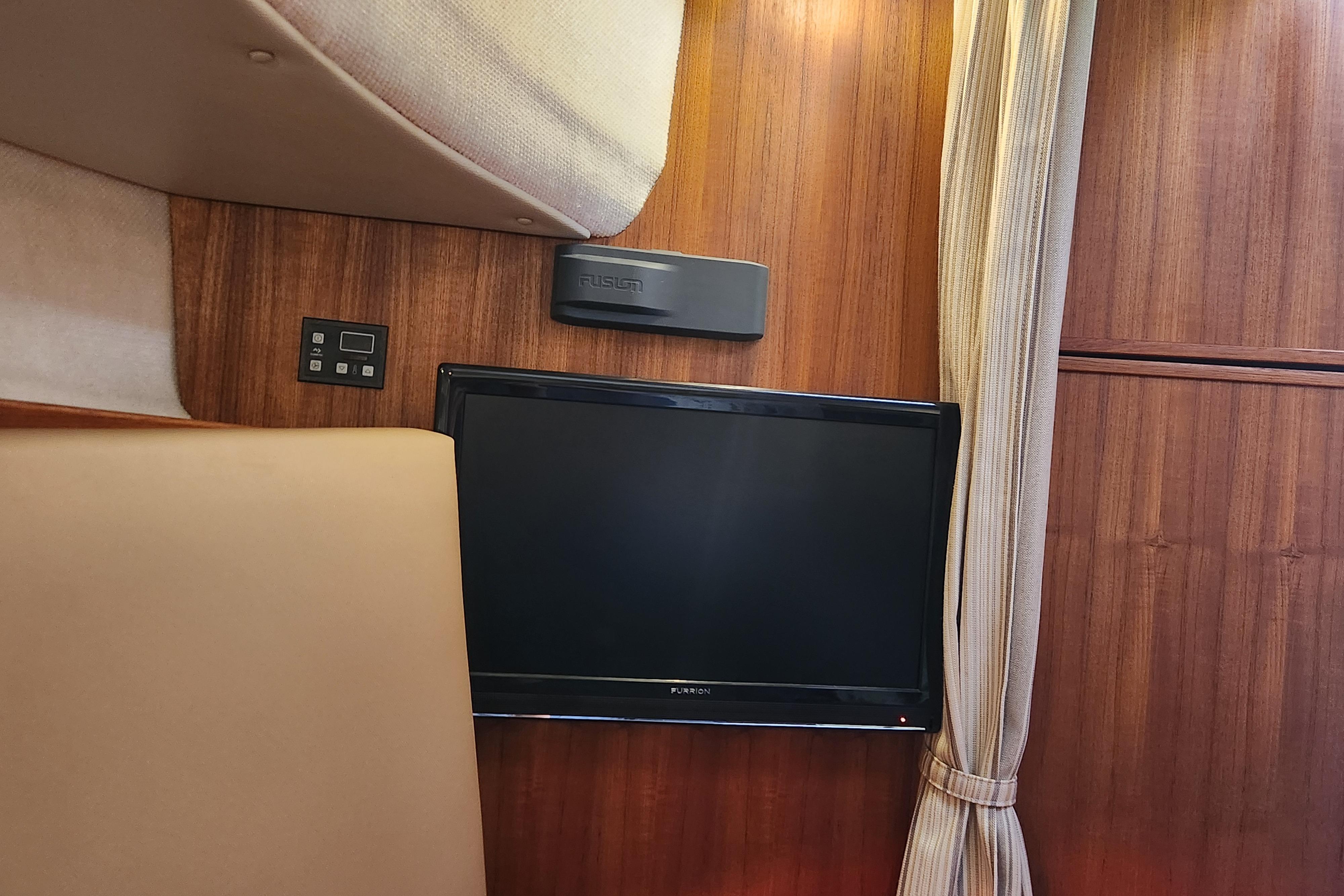 Interior of 2019 Ranger Tugs R-31 CB with TV and Fusion audio system.