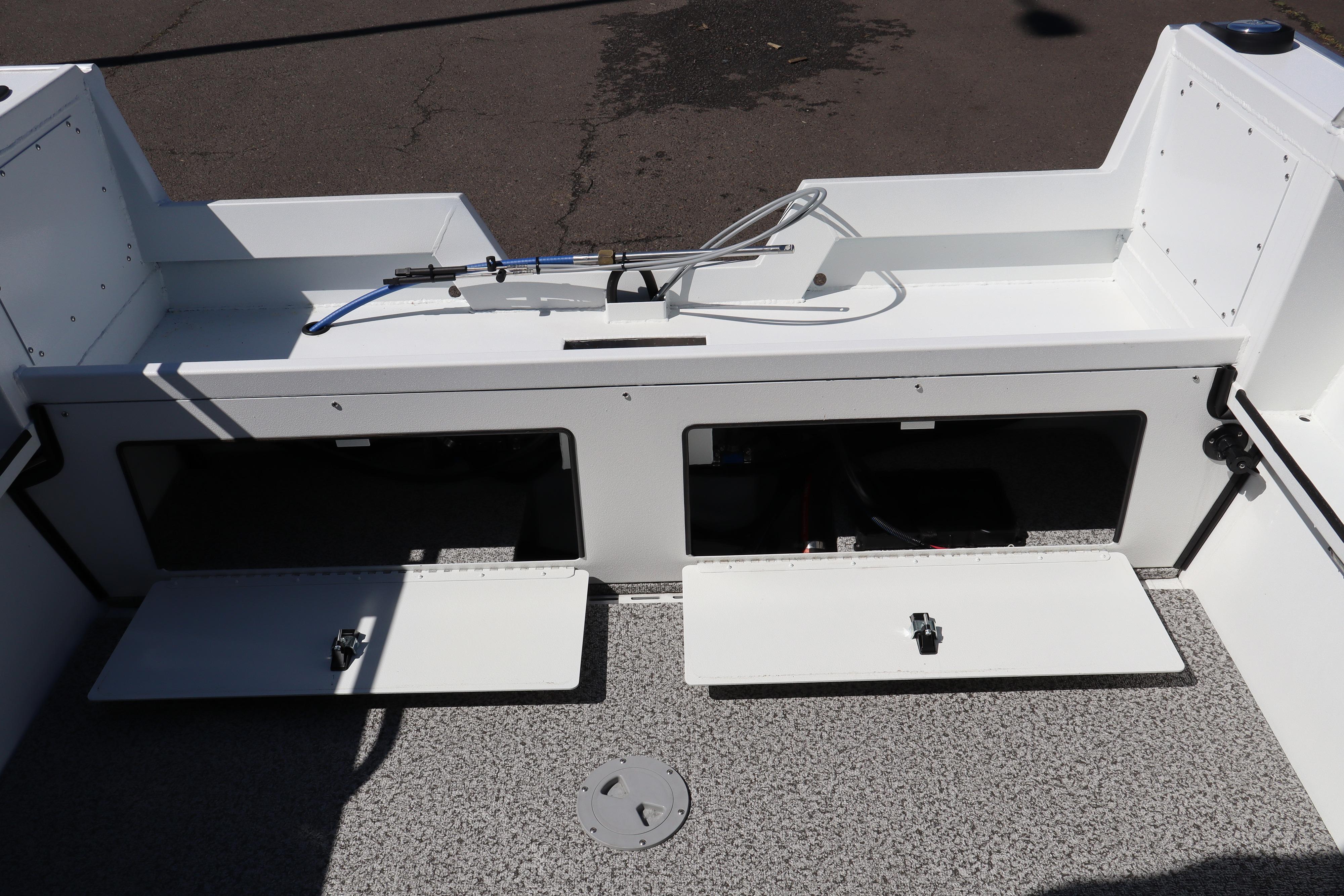 2026 Alumaweld Stryker 202 boat interior with open storage compartments and clean design.