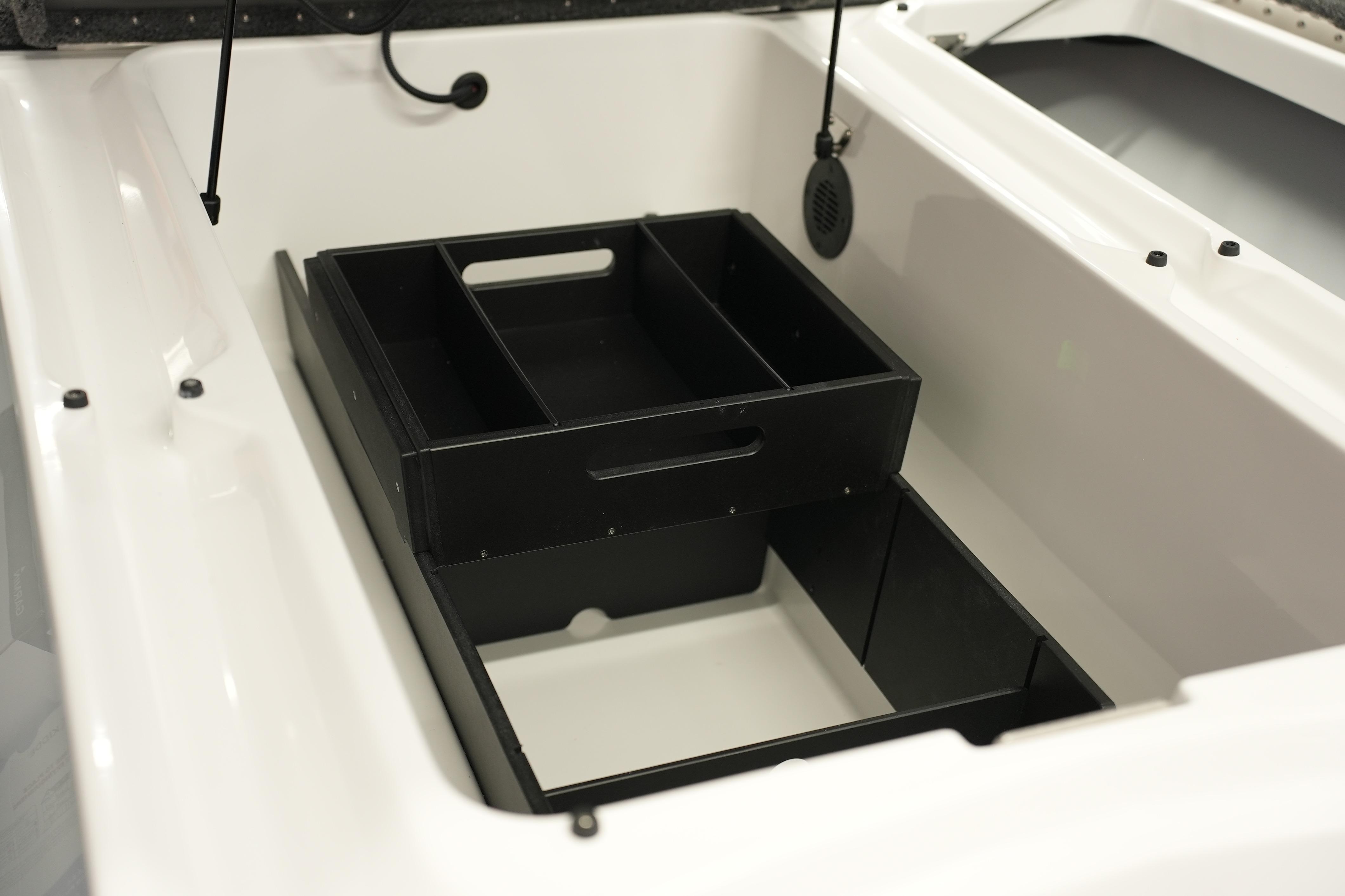 2026 iKon VLE21 boat storage compartment with black organizer tray.