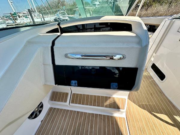 The image shows the cockpit of a 2018 Regal 3300 boat with sleek details.