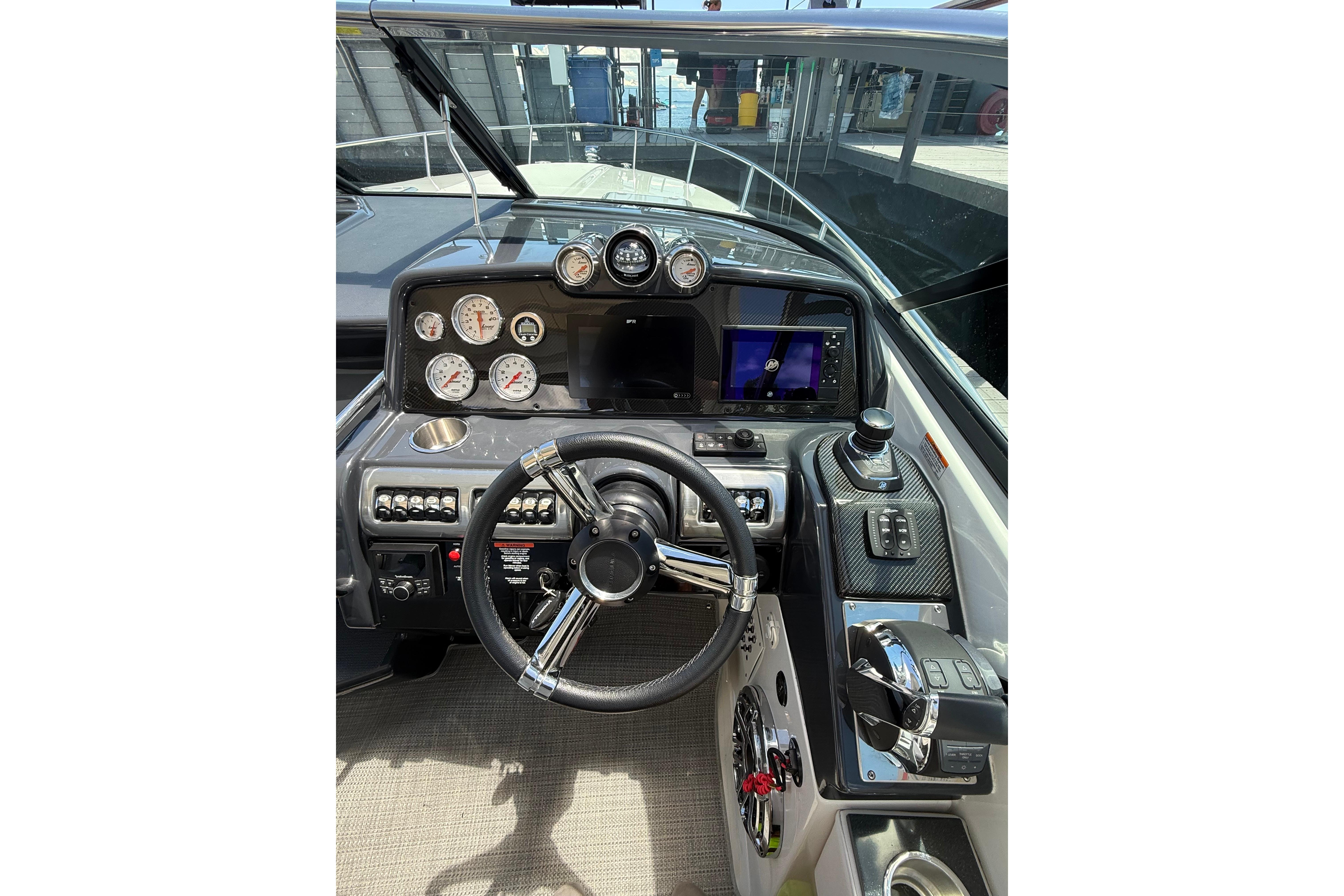 2021 Formula 350 Sun Sport dashboard with steering wheel, gauges, and navigation controls.