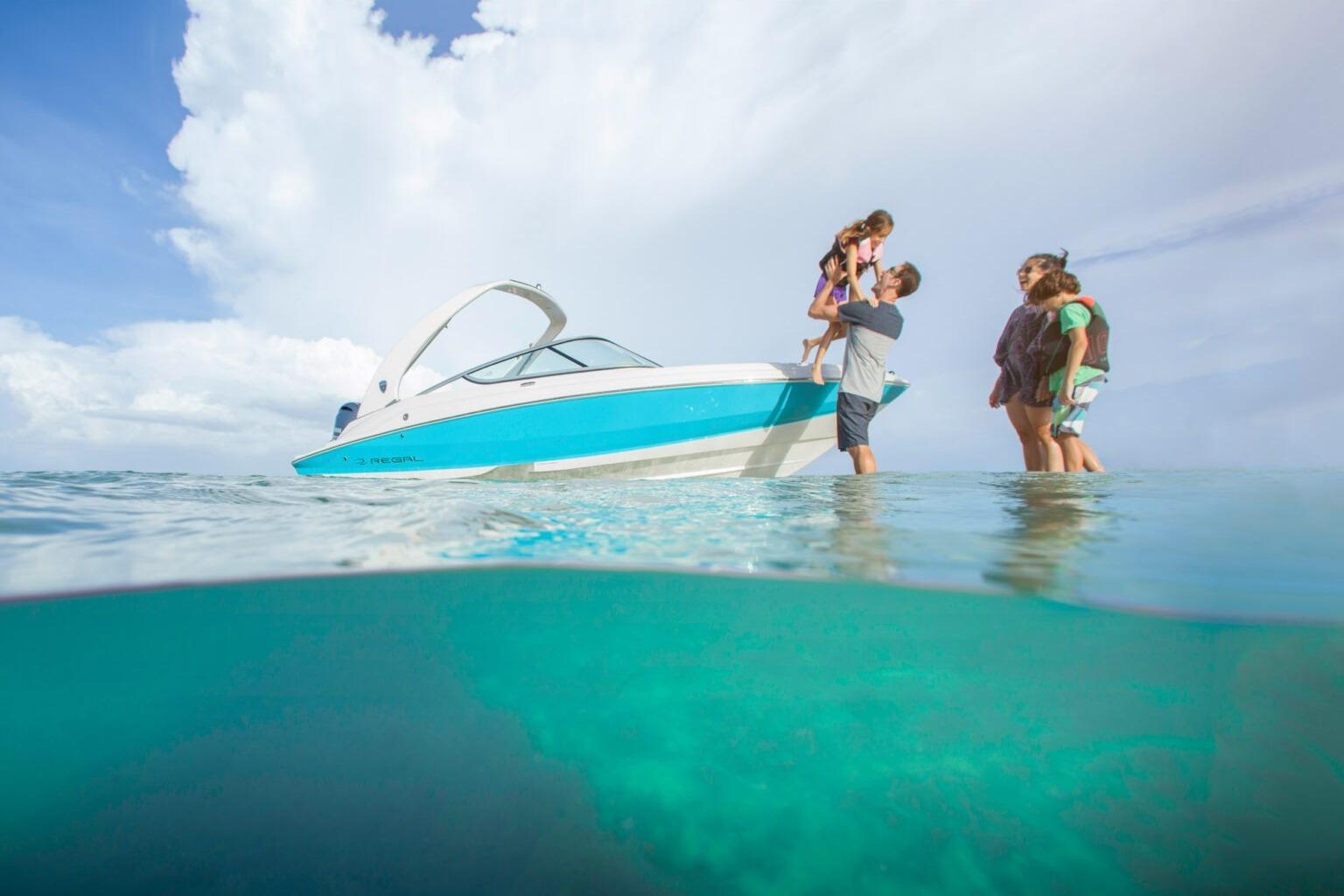 Family enjoying a day on the water with a 2026 Regal 21 OBX boat.