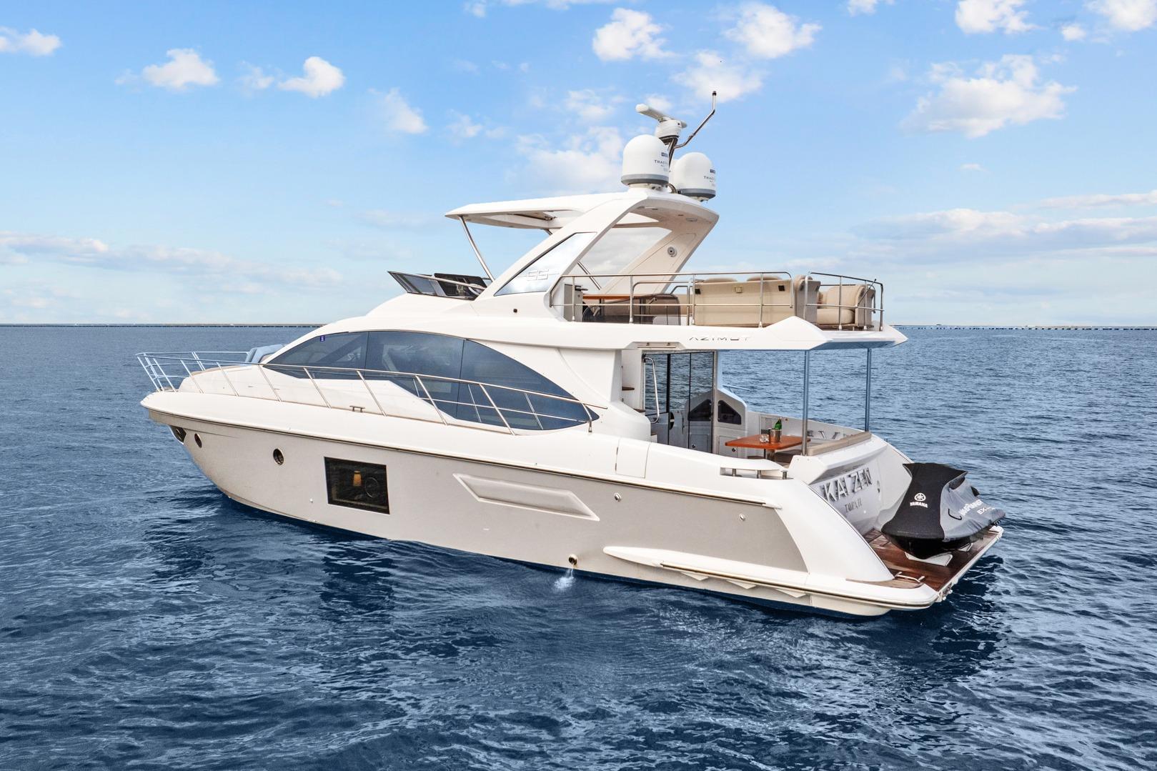 2019 Azimut 55 yacht cruising on open water under a clear sky.