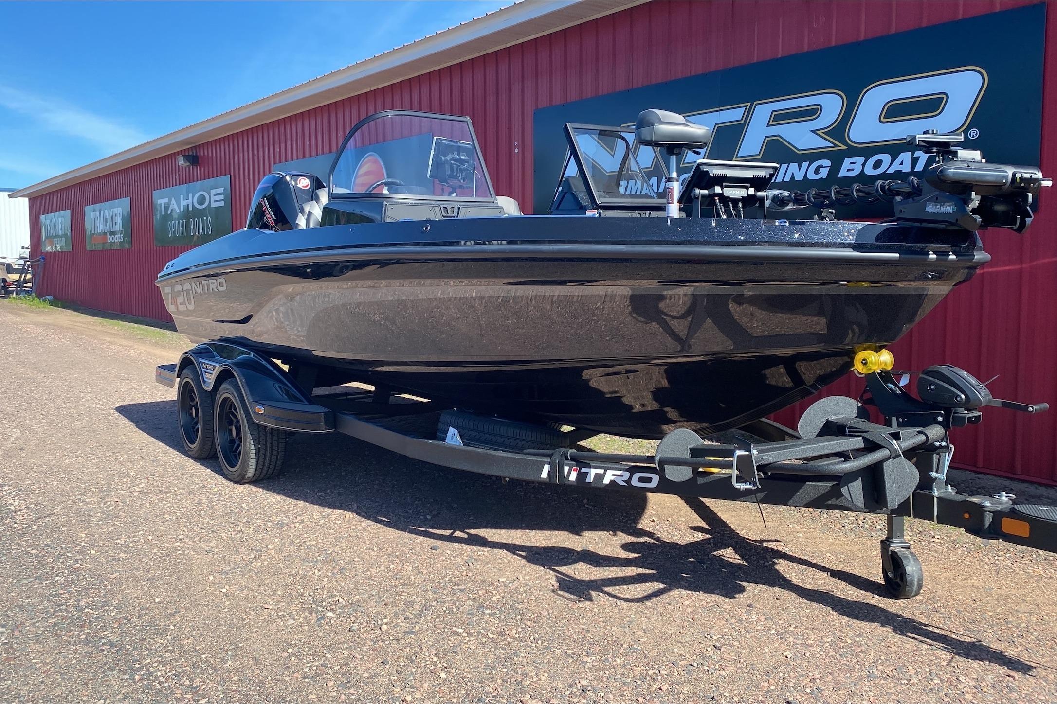 2026 Nitro ZV20 Pro fishing boat on trailer outside dealership.
