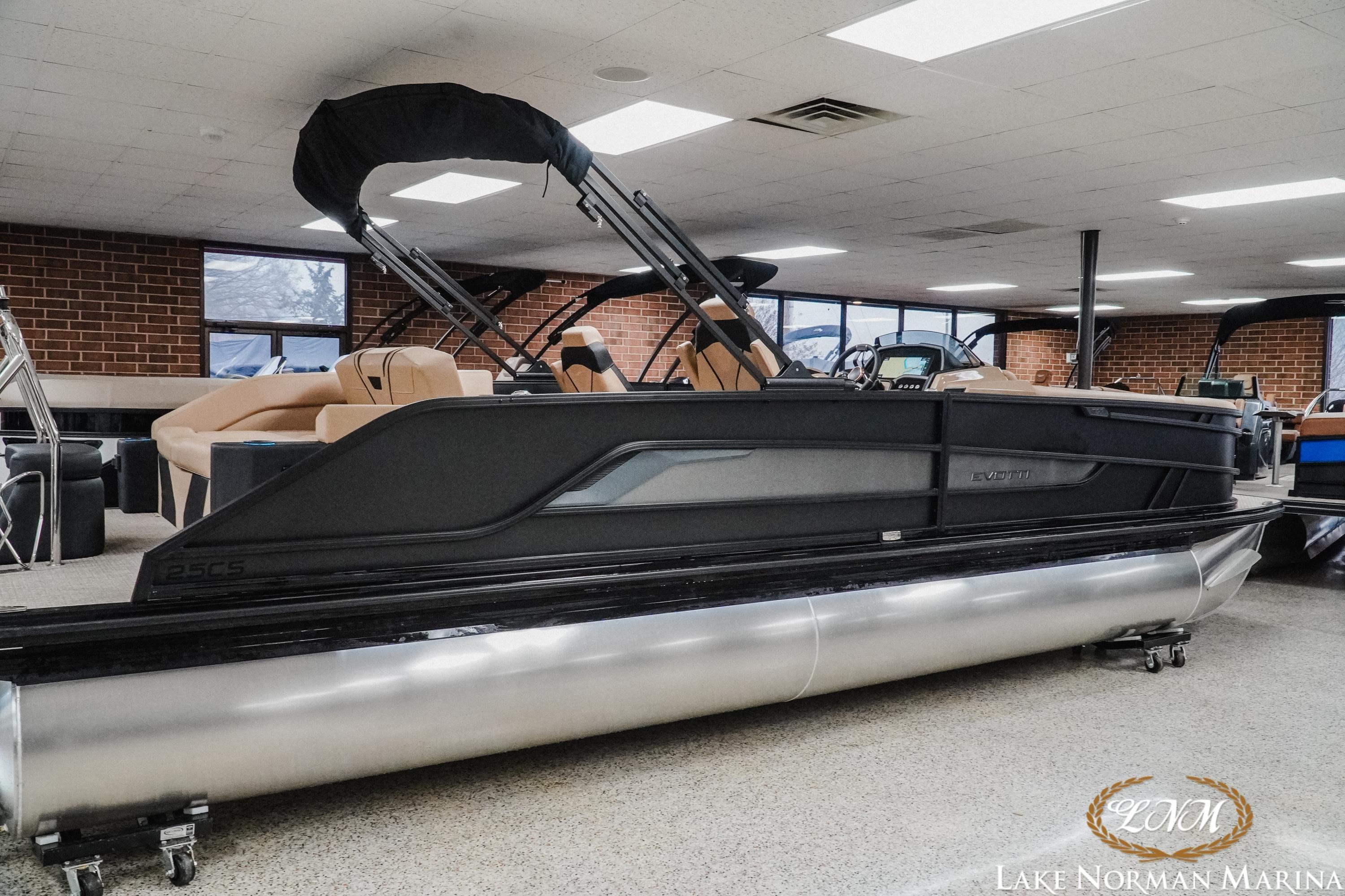 Evotti 725CS 2026 pontoon boat displayed indoors at Lake Norman Marina.