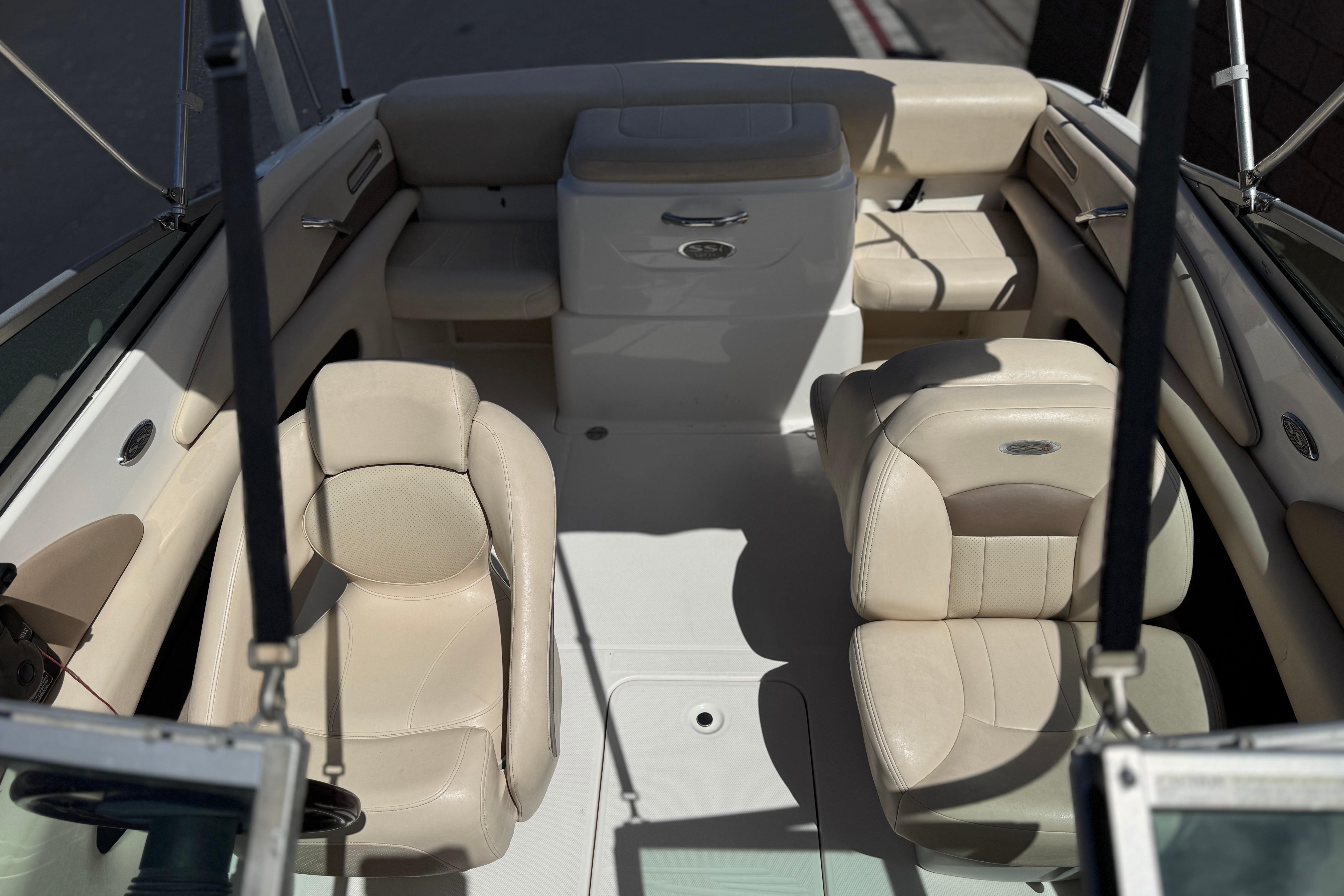 Interior of a 2006 Chaparral 190 SSi boat with beige seating.