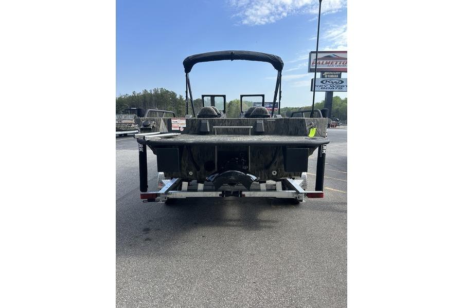 2025 SeaArk Predator 300 AK boat on trailer, rear view, outdoor setting.