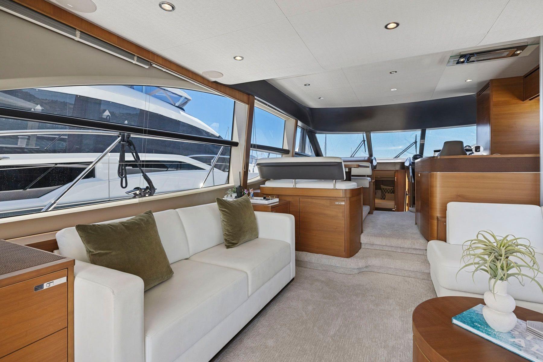 Luxurious interior of a 2015 Princess 60 Flybridge Motor Yacht with elegant furnishings.