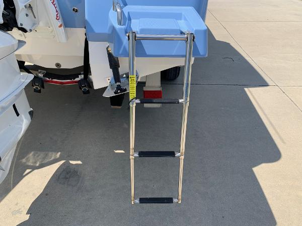 2024 Robalo 266 Cayman boat with extended swim ladder.