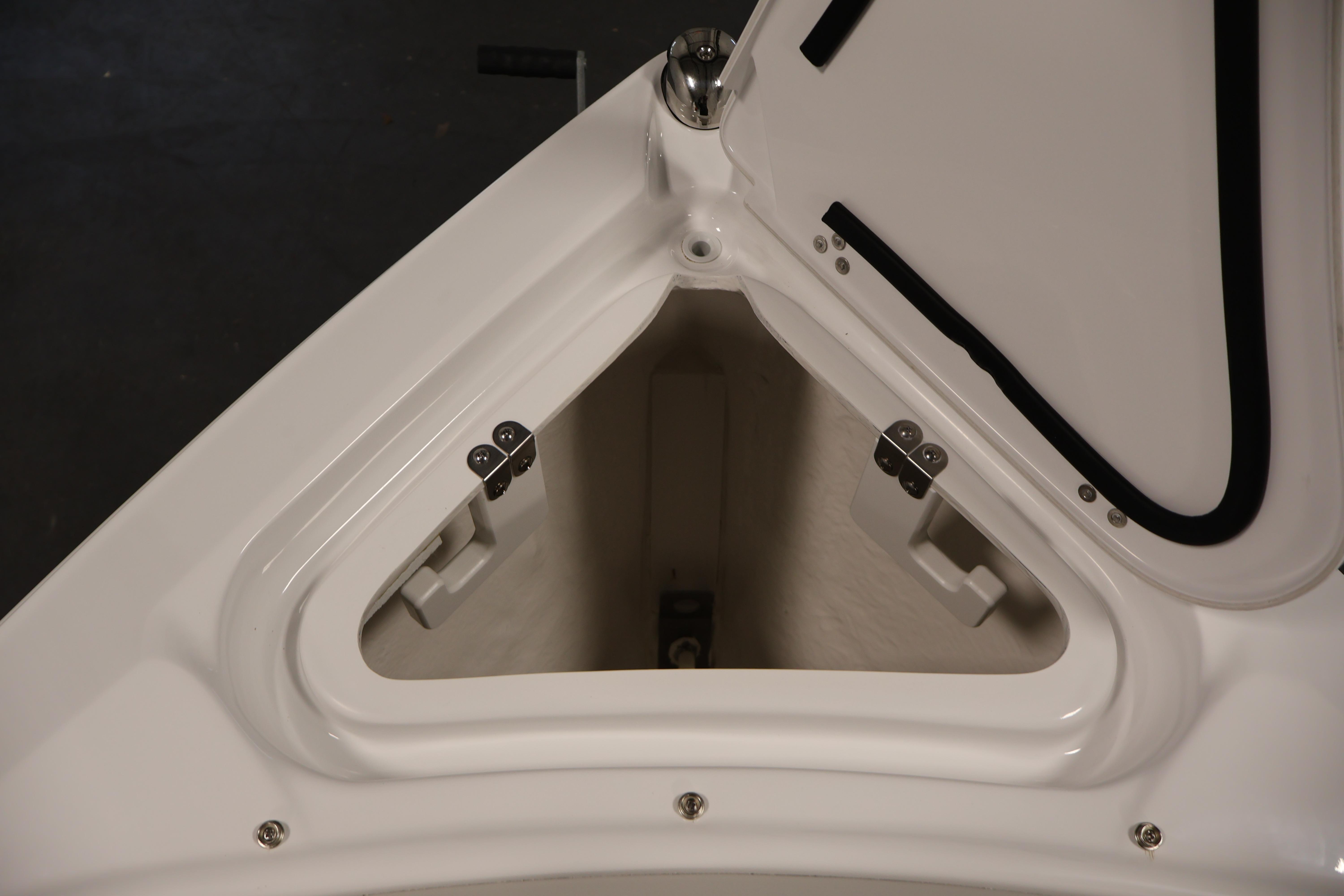 Open storage compartment on 2026 Four Winns H4 Freedom boat.
