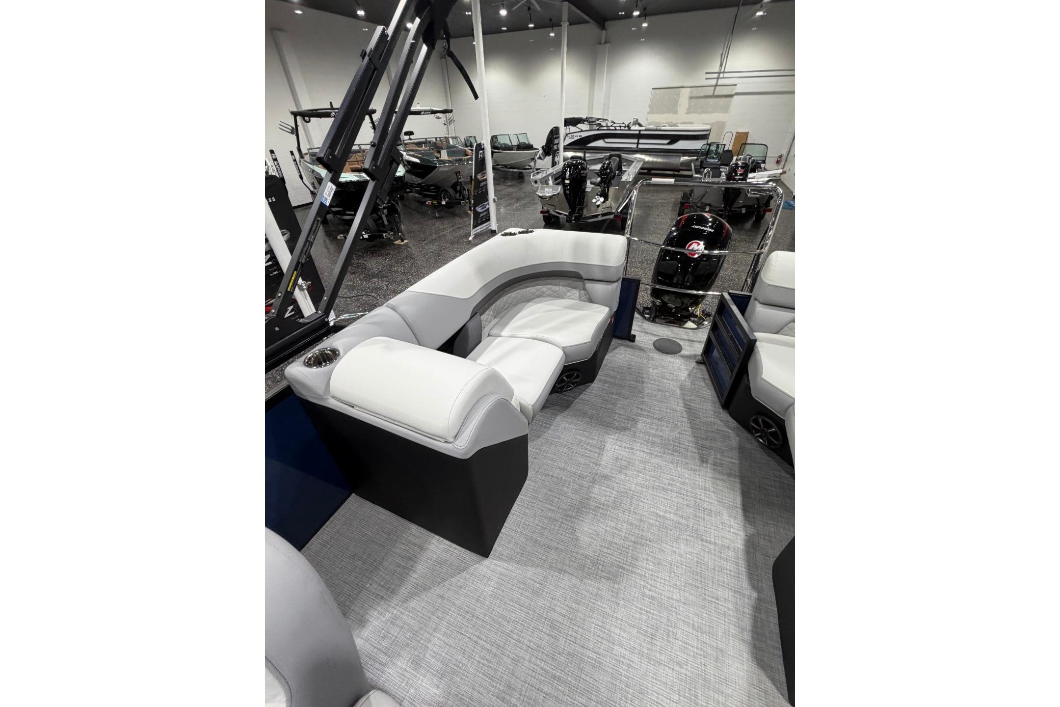 Interior of 2026 Lowe SS 230 WT boat with plush seating and modern design.