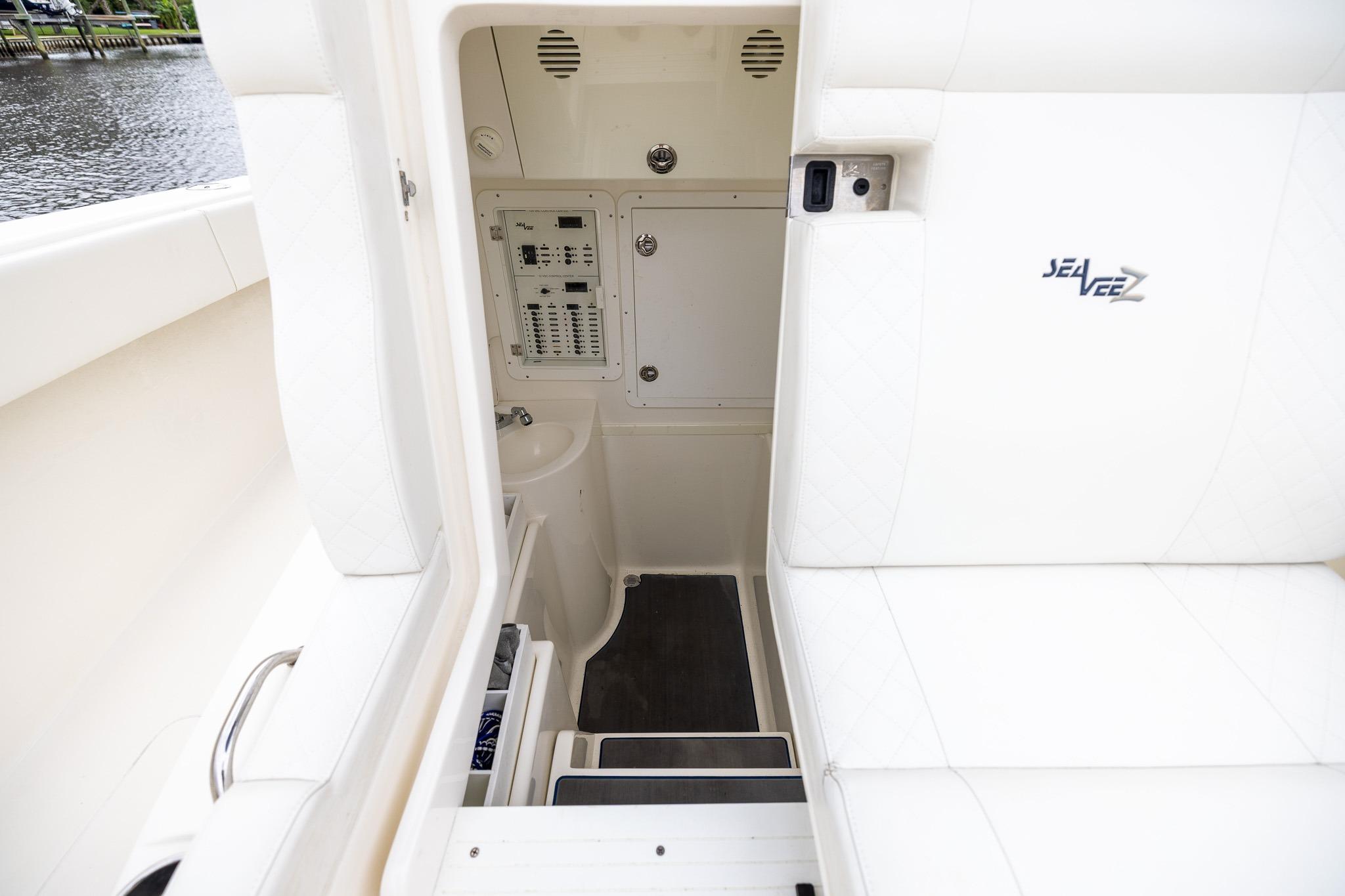 2019 SeaVee 322Z boat interior with control panel and seating area.