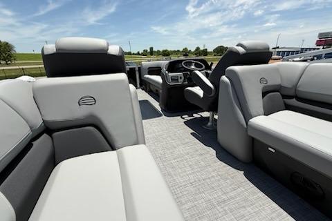 2026 Sun Tracker Party Barge 22 XP3 interior with plush seating and modern dashboard.