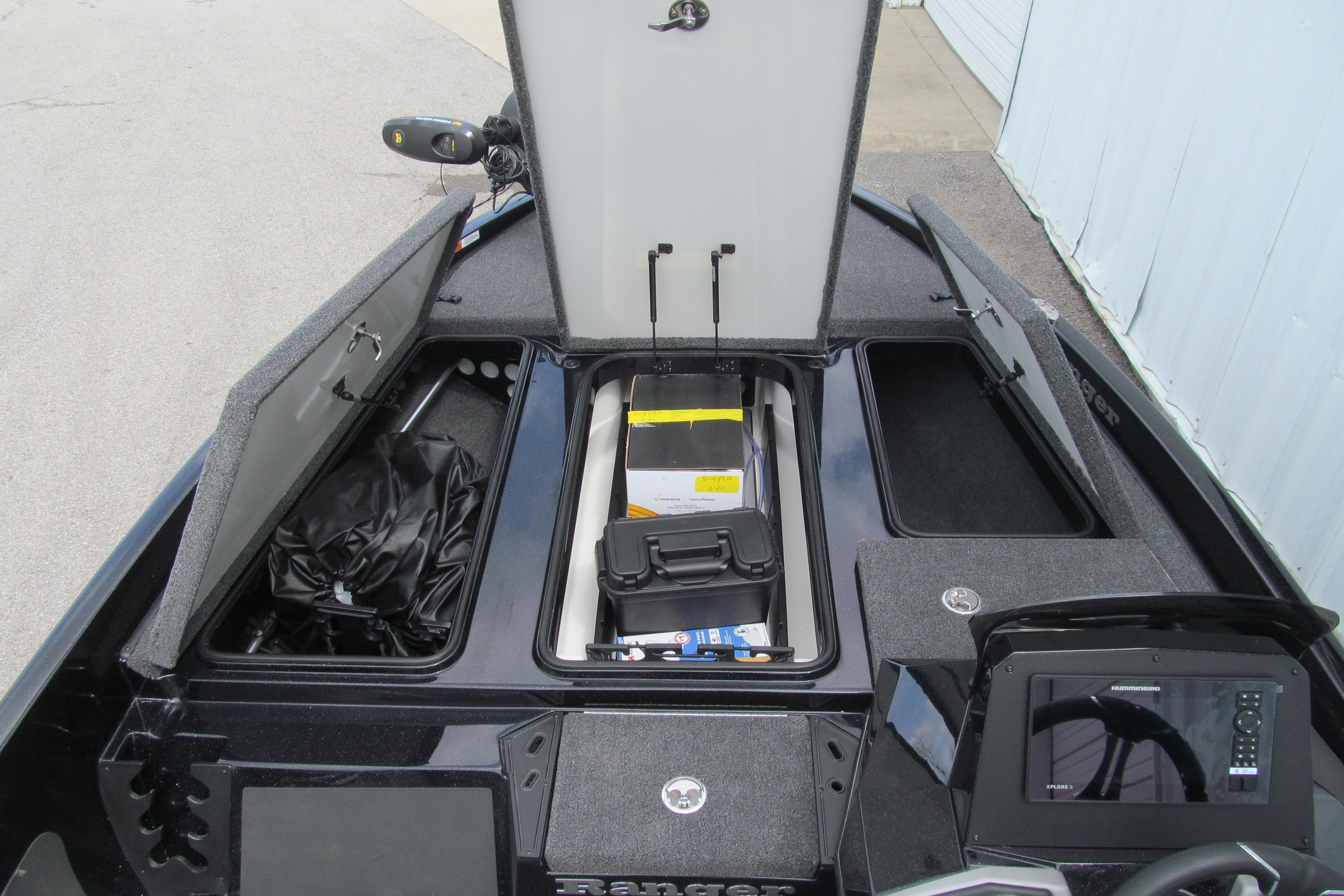 2026 Ranger Z185 boat storage compartments open, showcasing organized interior space.