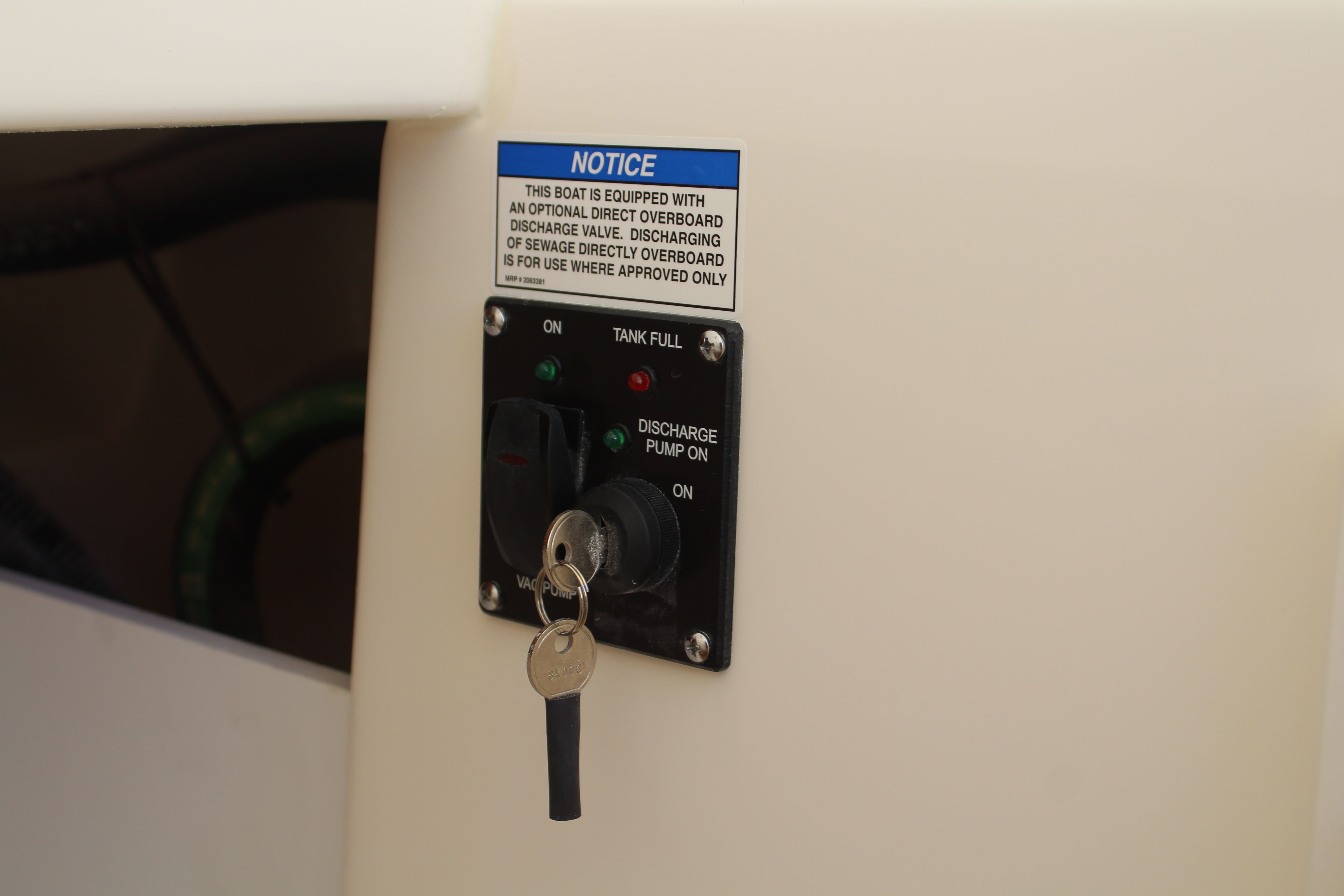 Key control for discharge pump on Boston Whaler 330 Outrage 2026.