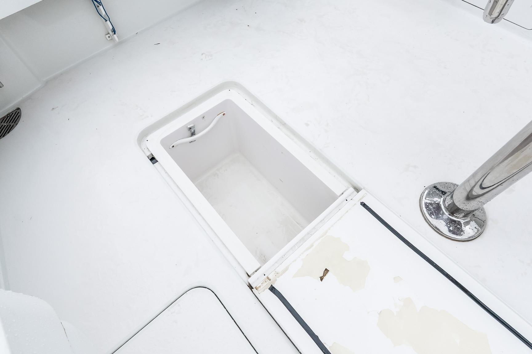 Open storage compartment on 2000 Viking 50' Convertible yacht deck.