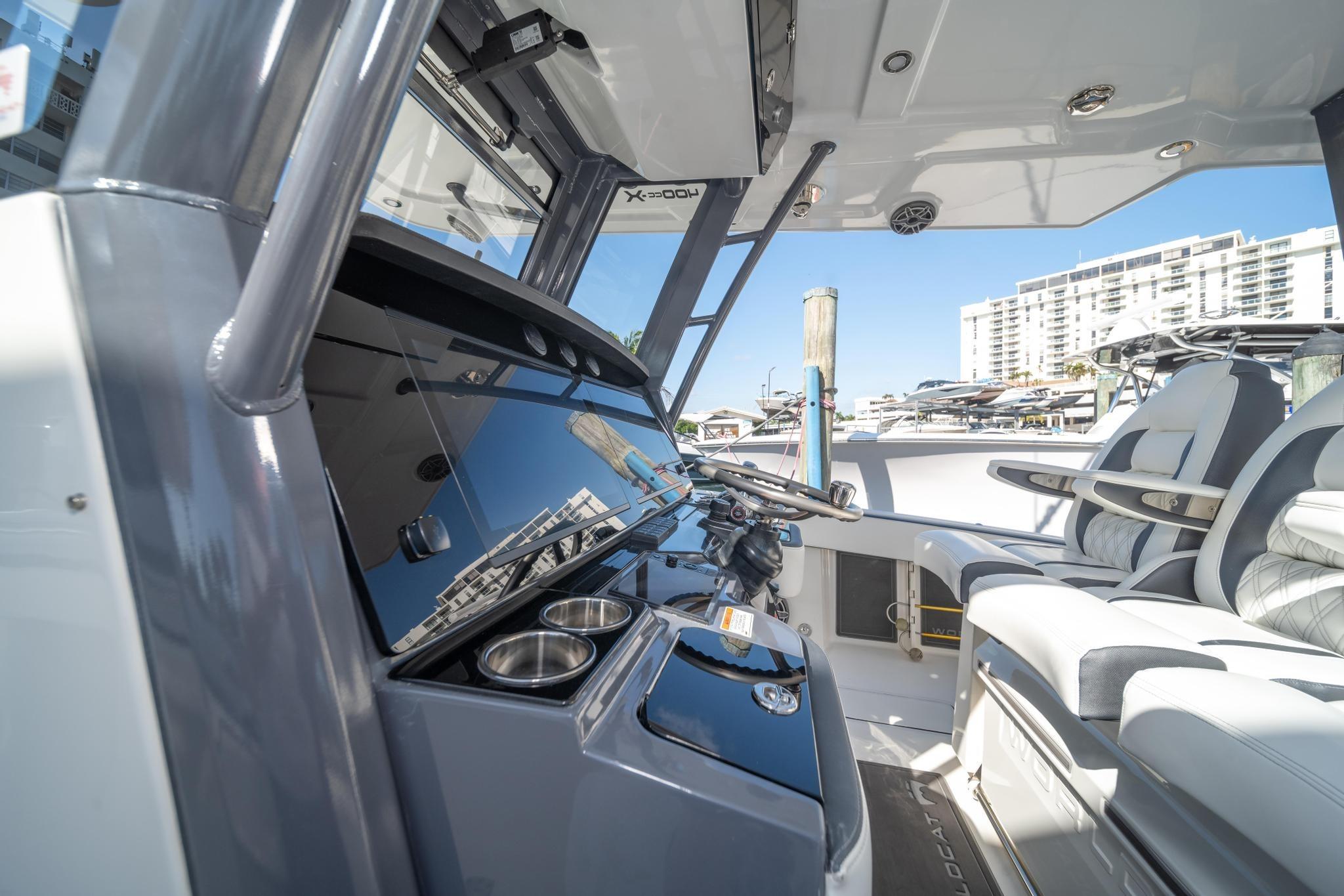 Interior view of 2022 World Cat 400 CC-X boat, featuring sleek design and modern controls.