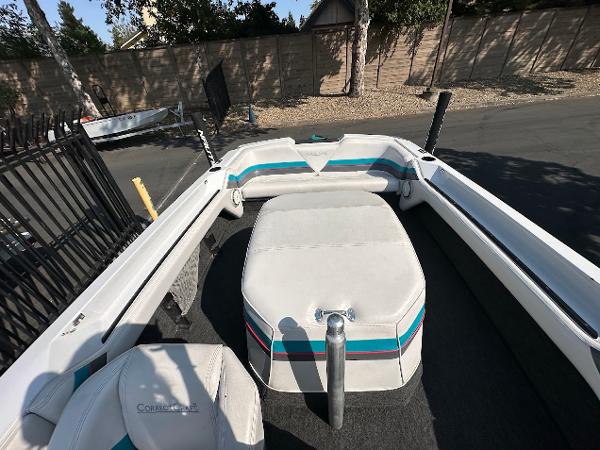1992 Correct Craft Ski Nautique boat interior with white and teal upholstery.