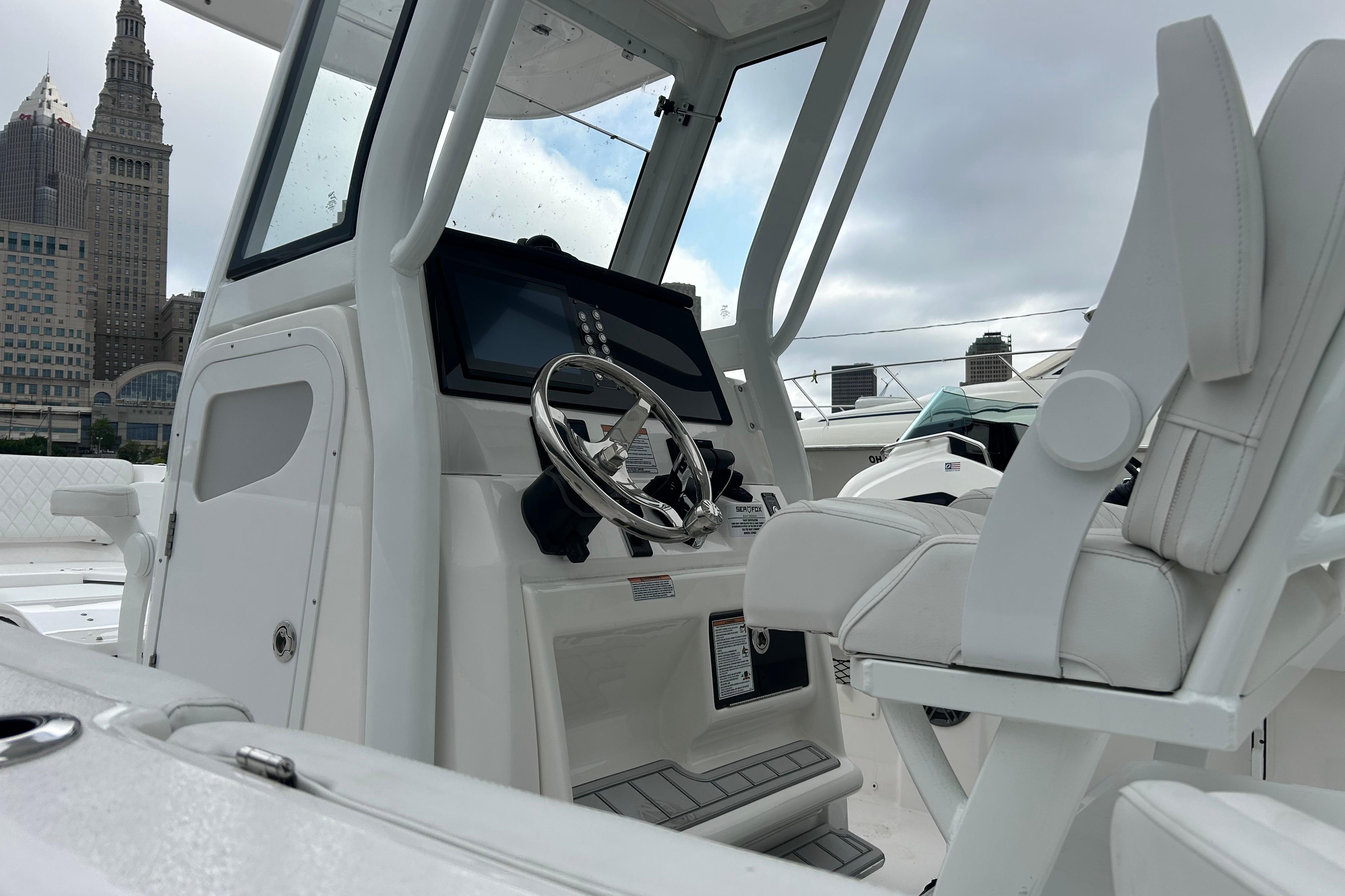 Interior view of 2026 Sea Fox 268 Commander boat with modern helm and seating.