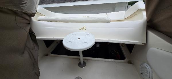 1999 Sea Ray 280 SS boat interior with seating and table.