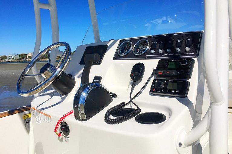 Manufacturer Provided Image: 2026 Boston Whaler 190 Montauk boat dashboard with steering wheel and controls.
