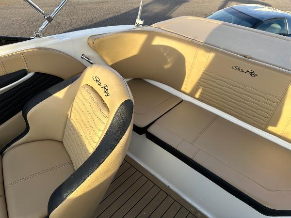 Interior of a 2021 Sea Ray SPX 190 with beige seats.