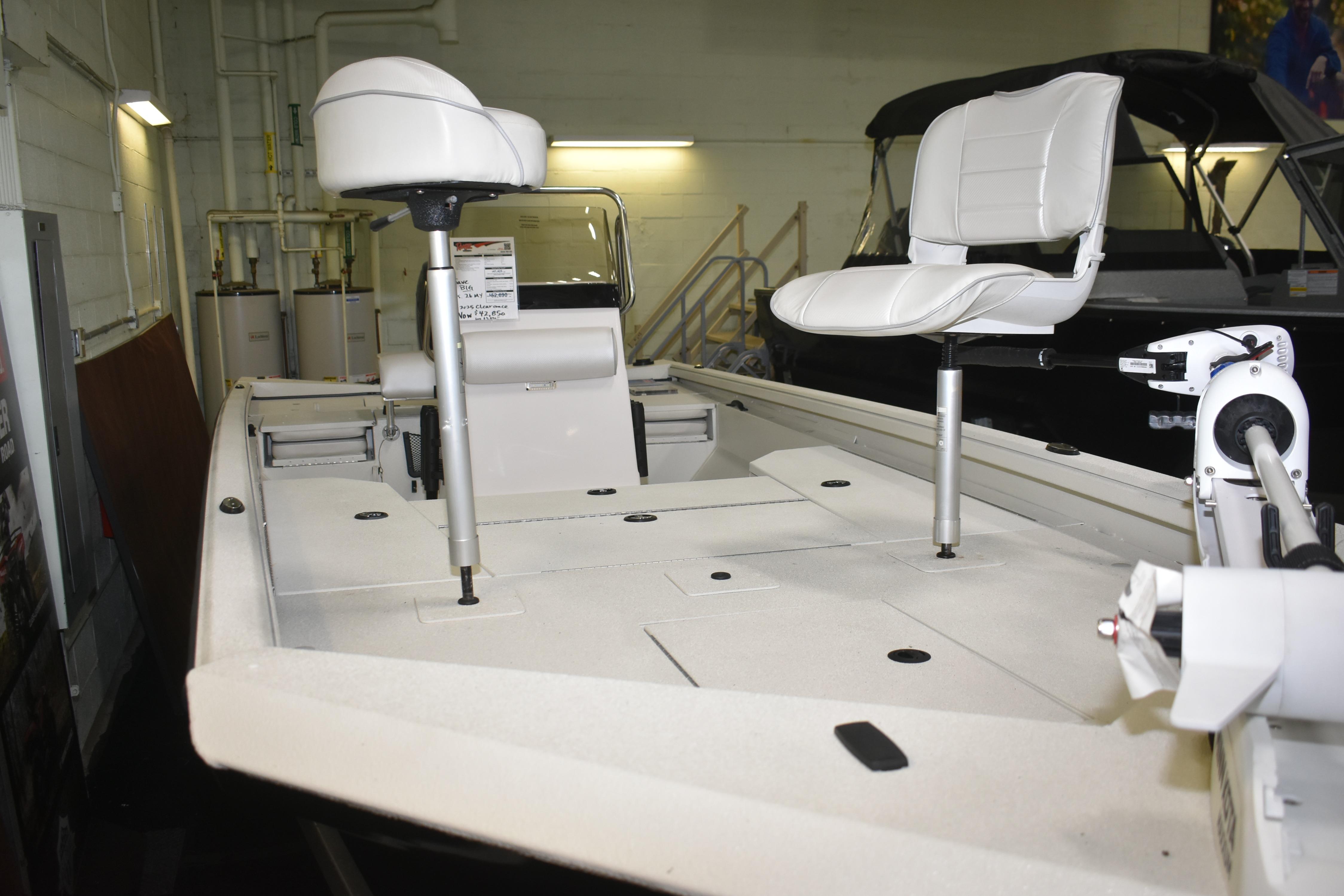 2024 Ranger RB200 boat interior with white seating and fishing equipment.