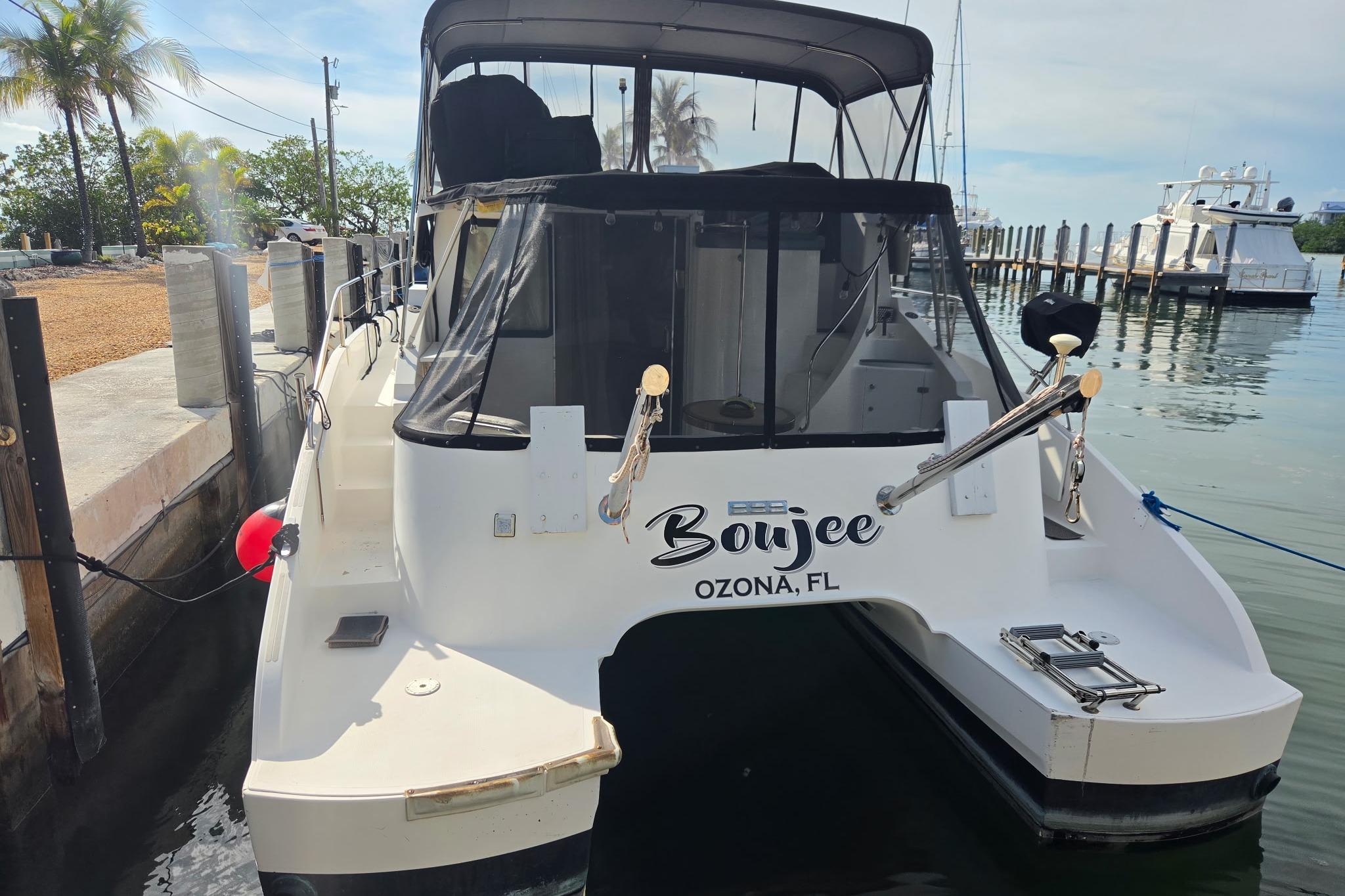 Fountaine Pajot Maryland 37 boat docked in Ozona, FL, named "Boujee," year 2000 model.