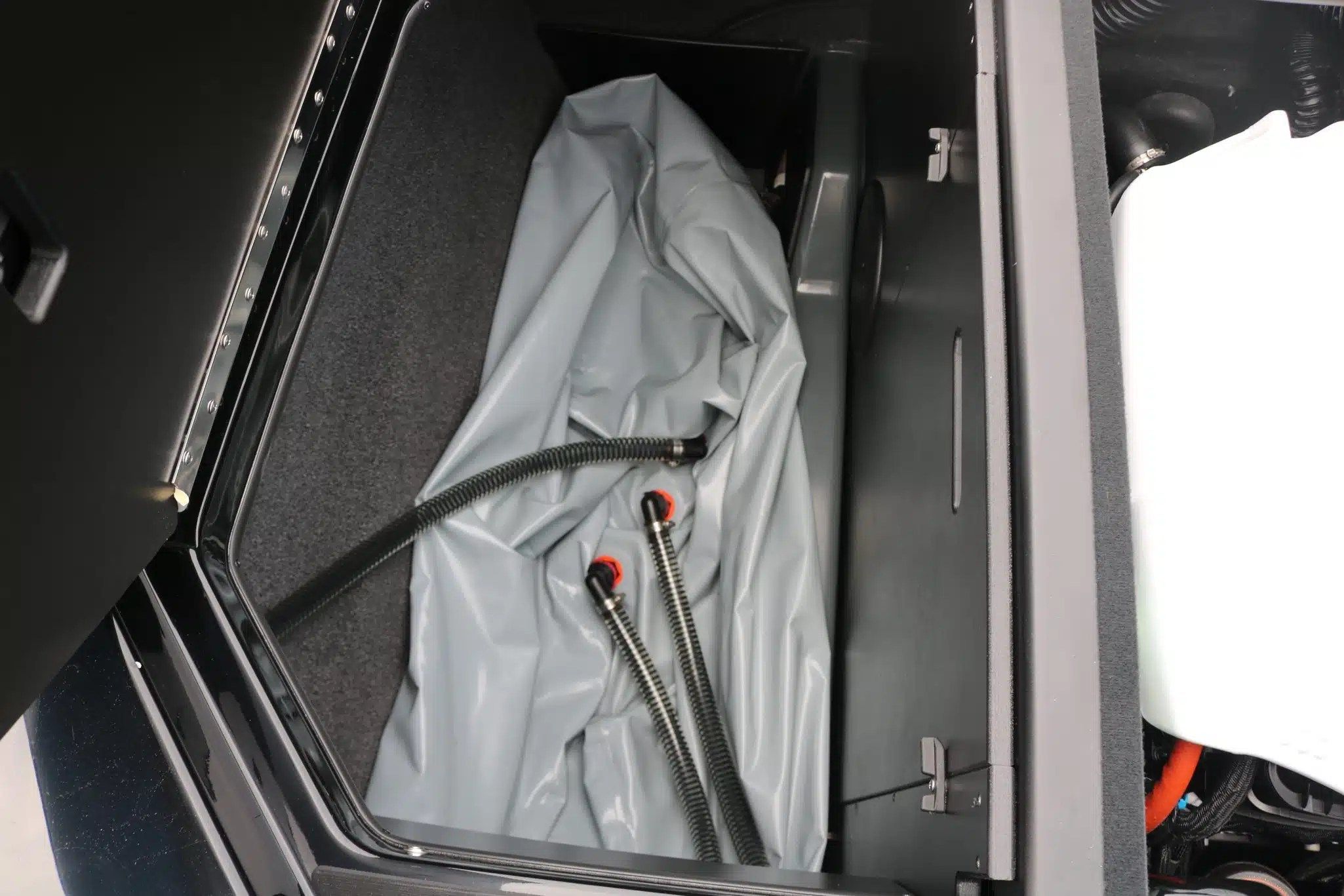 Interior view of 2024 ATX Surf Boats 24 Type-S storage compartment.