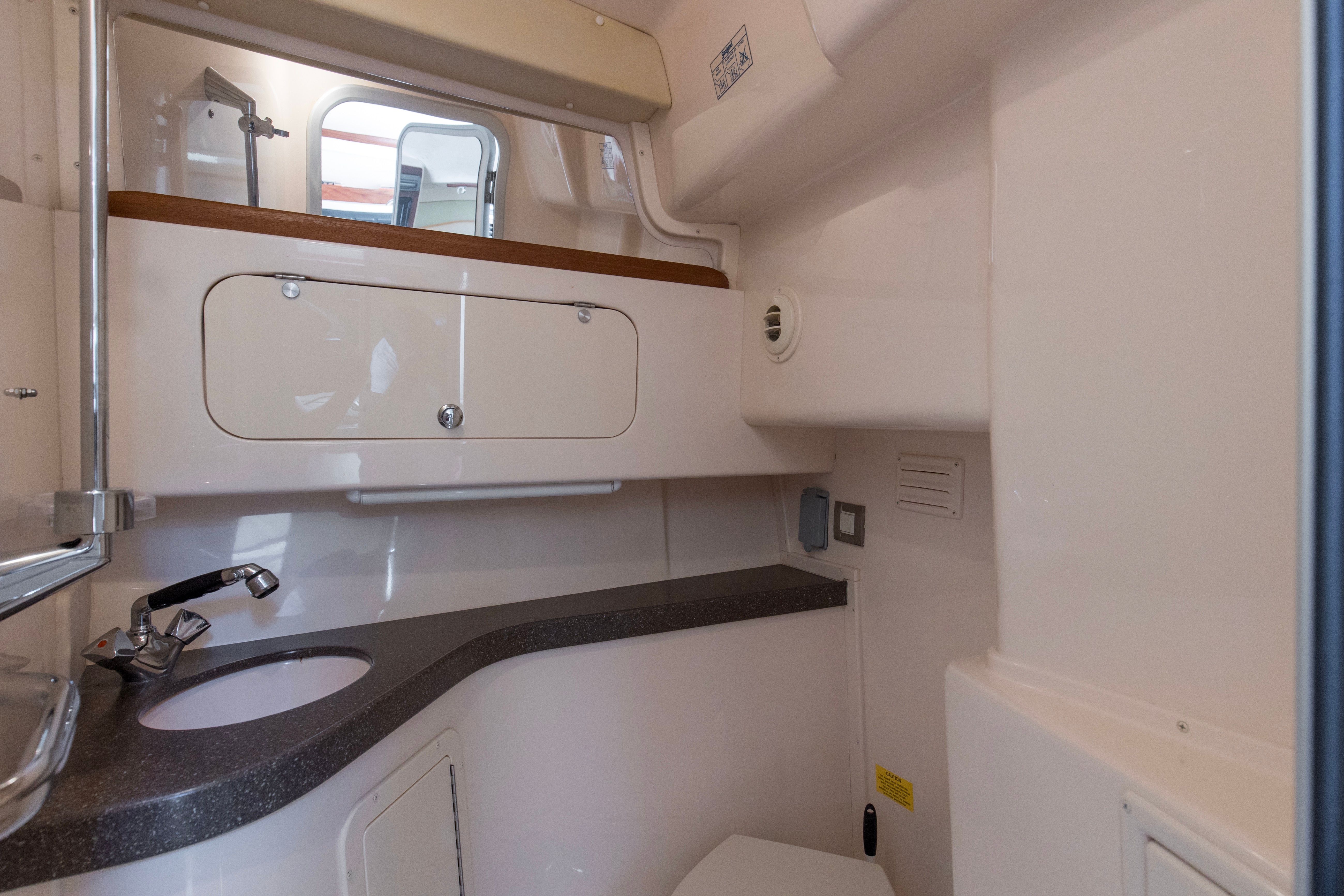 Interior of Grady-White Express 330 yacht, bathroom view.