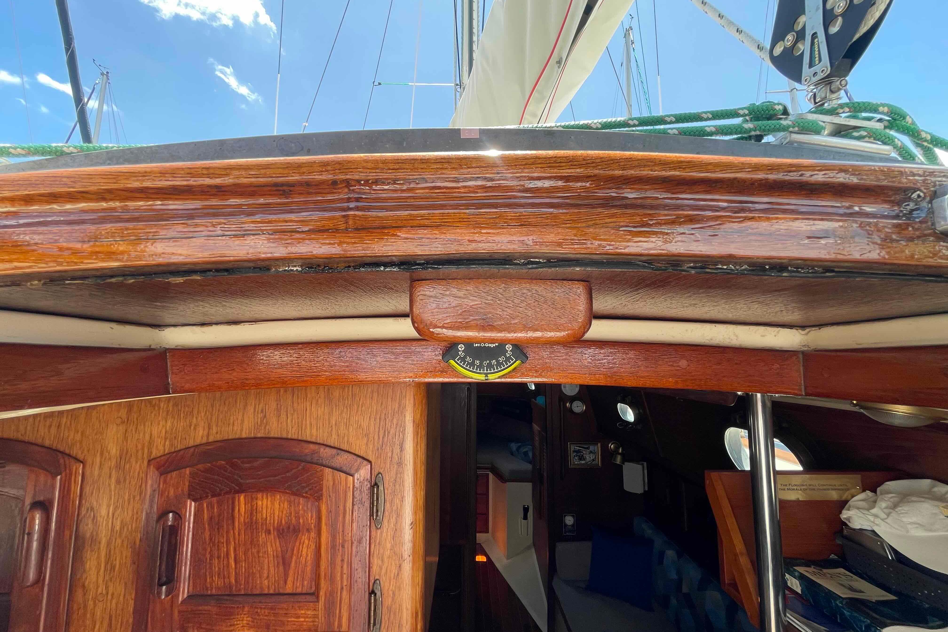 Interior view of a 1987 Pacific Seacraft 34 sailboat with wooden finishes.