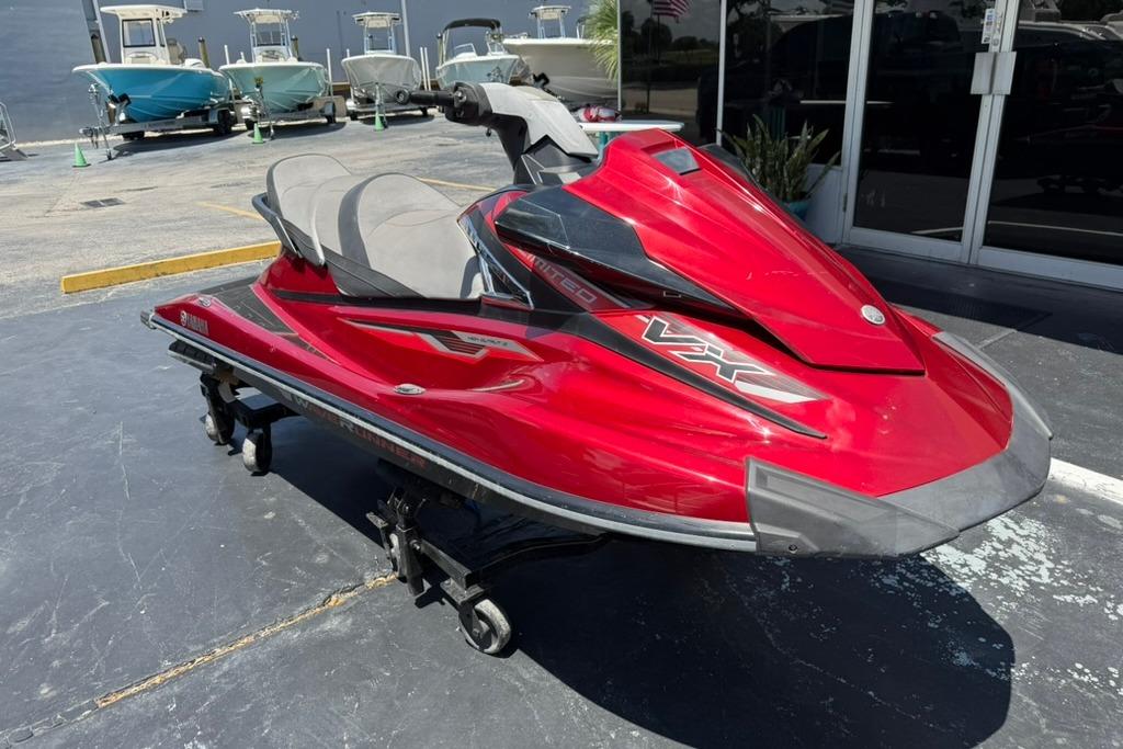 Red 2019 Yamaha VX Limited jet ski parked outdoors on a sunny day.