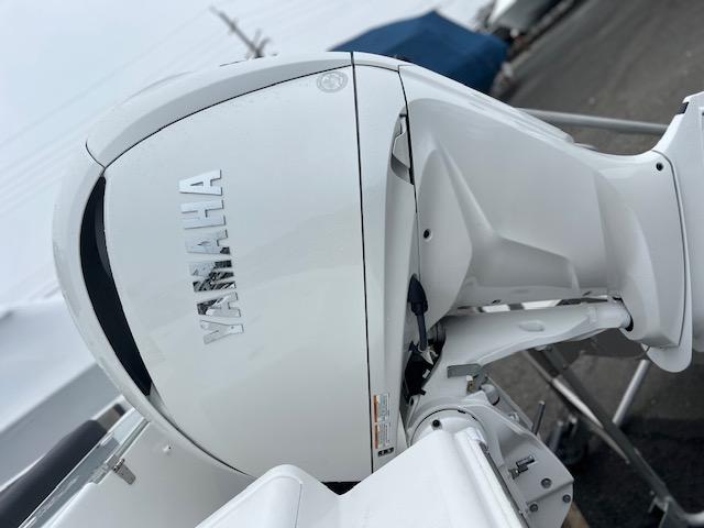2025 Sea Pro 240 Dual Console with Yamaha outboard motor, side view.