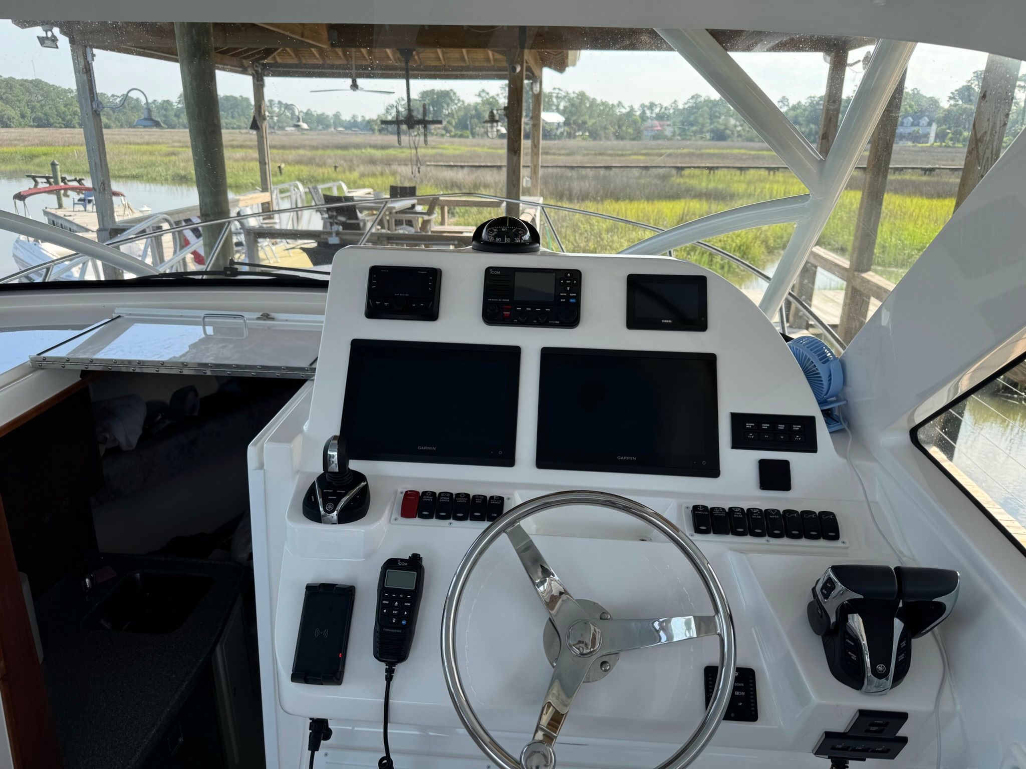 Helm of the 2024 Albemarle 30 Express with modern instruments.