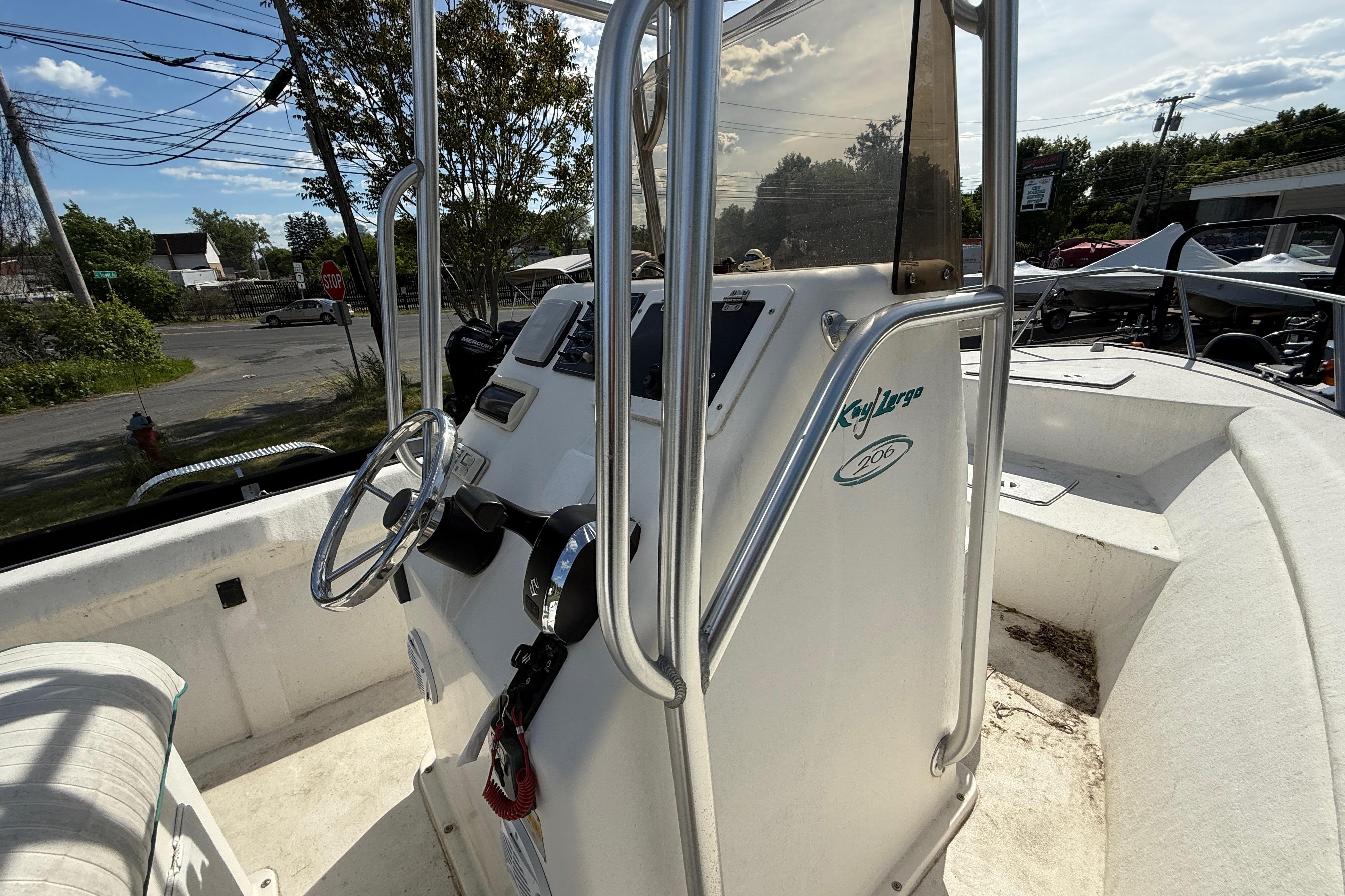 2008 Key Largo 206 Center Console boat interior with steering wheel and controls.