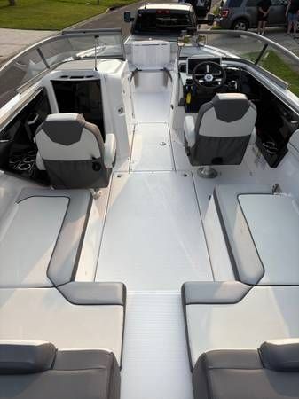 Interior view of a 2021 Yamaha AR250 boat with gray seating.