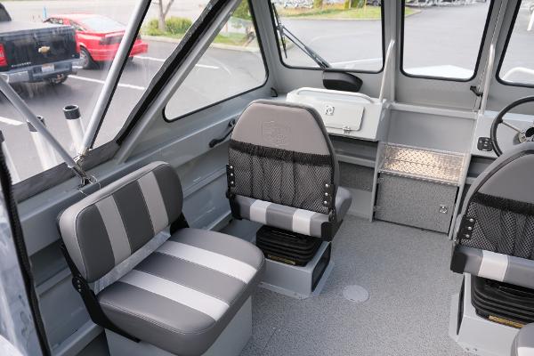 2024 Hewescraft 180 Pro-V ET boat interior with gray seating and spacious cabin design.
