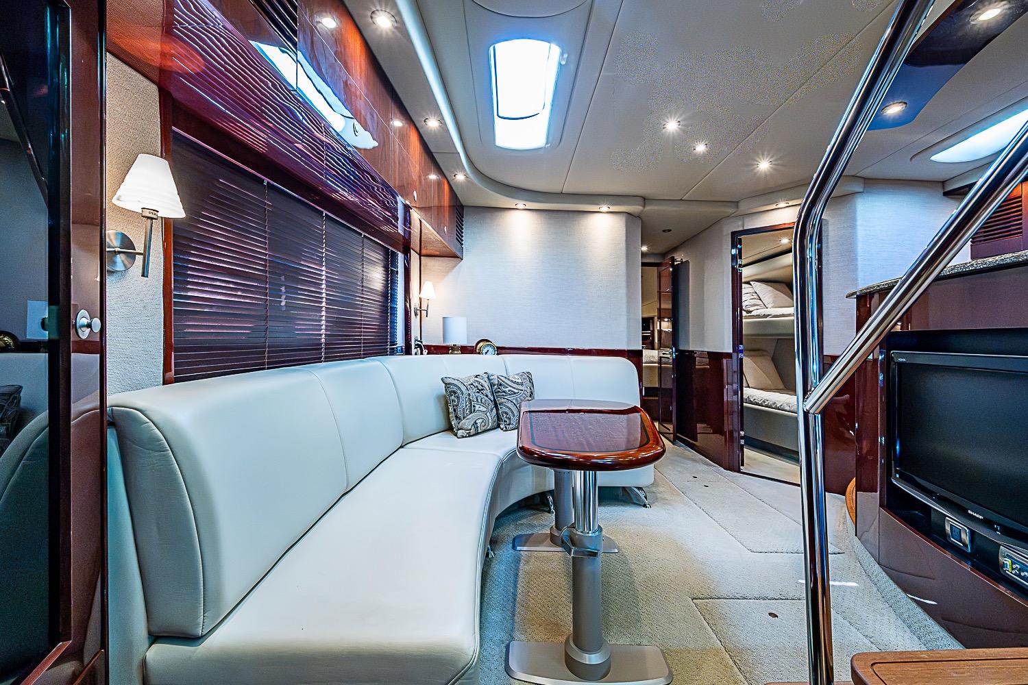 Luxurious interior of 2008 Sea Ray 60 Sundancer yacht with elegant seating and modern amenities.