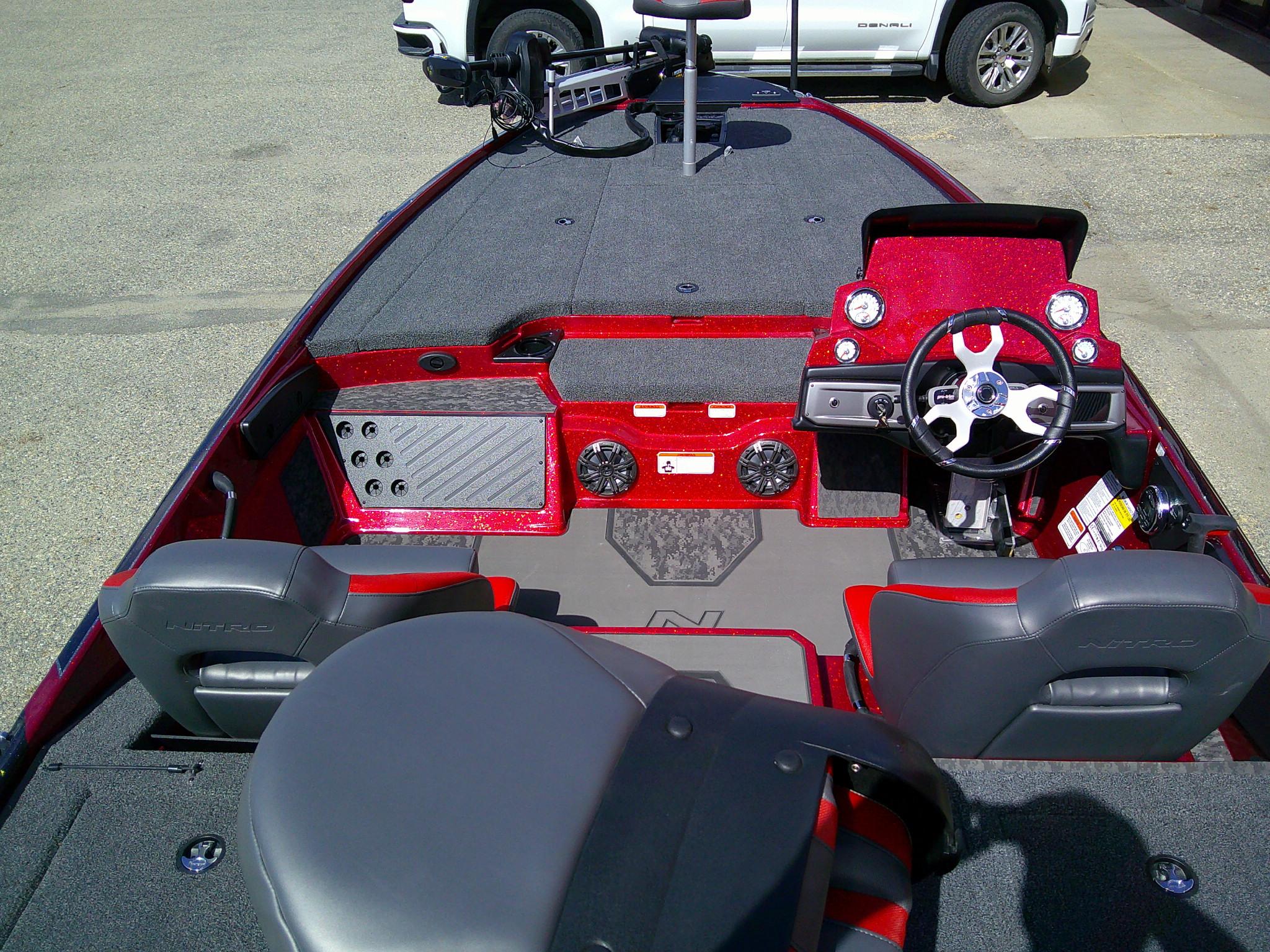 2025 Nitro Z20 XL boat interior with steering wheel and seating.