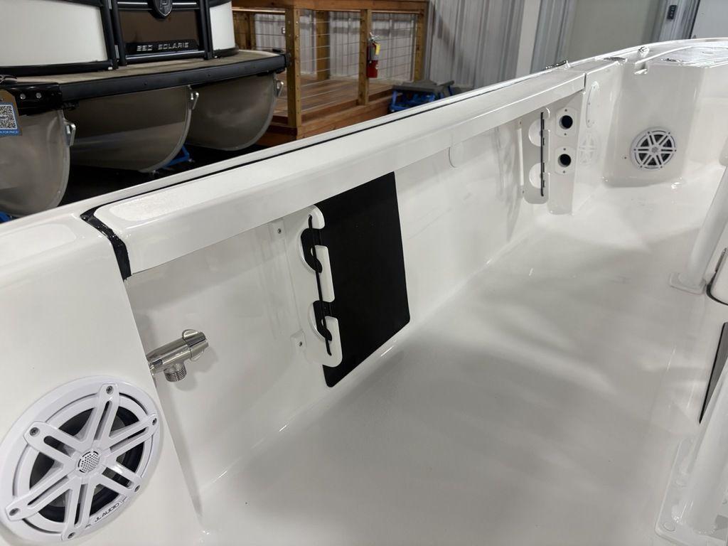 2026 Tidewater 2110 BM boat interior with speaker and storage features.