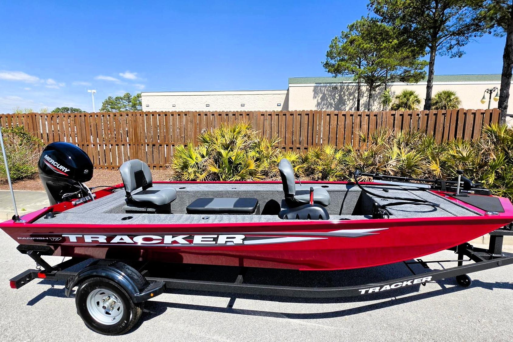 2026 Tracker Panfish 17 boat, red exterior, parked outdoors on a trailer.